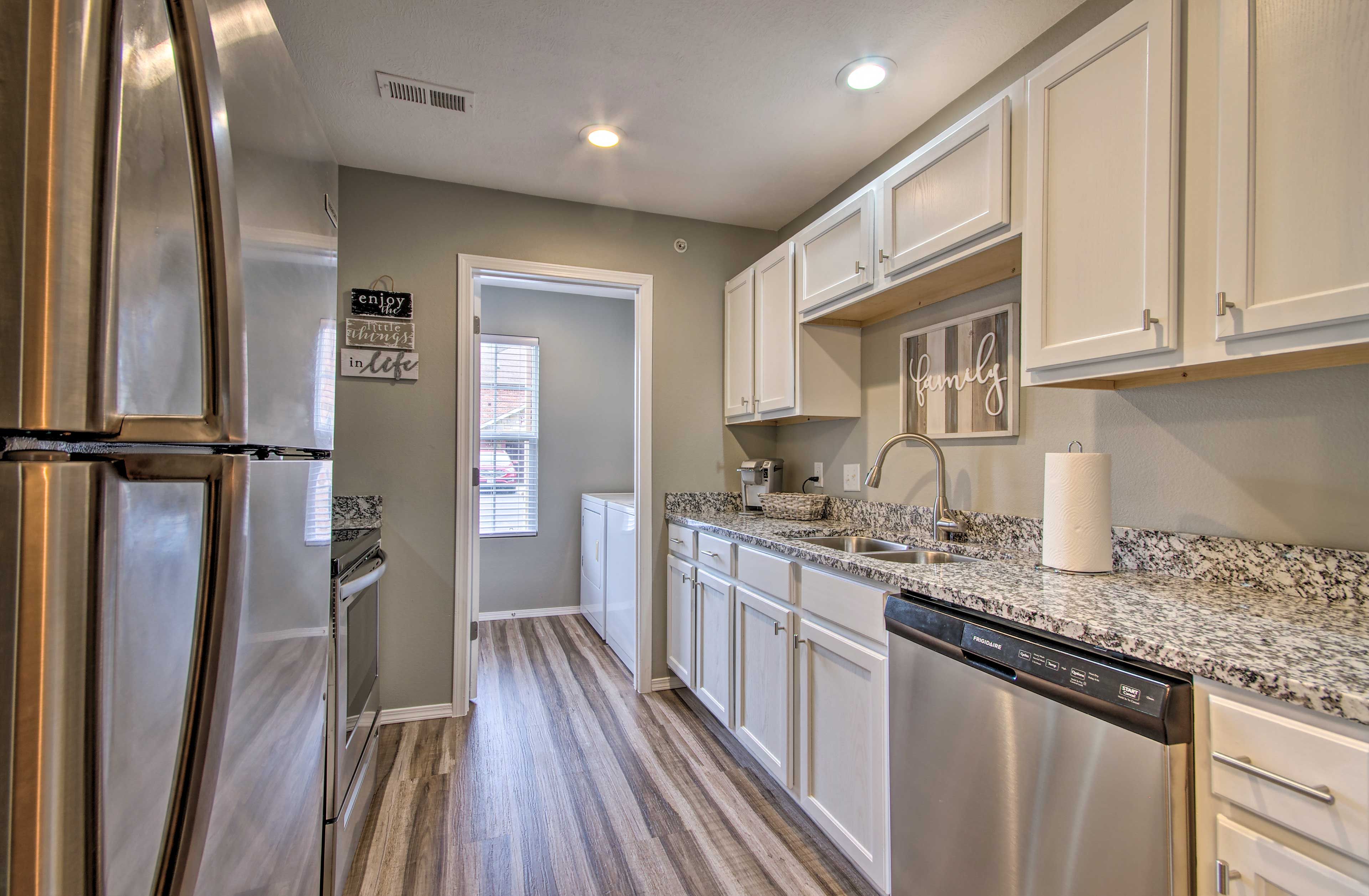 The kitchen boasts stainless steel appliances.