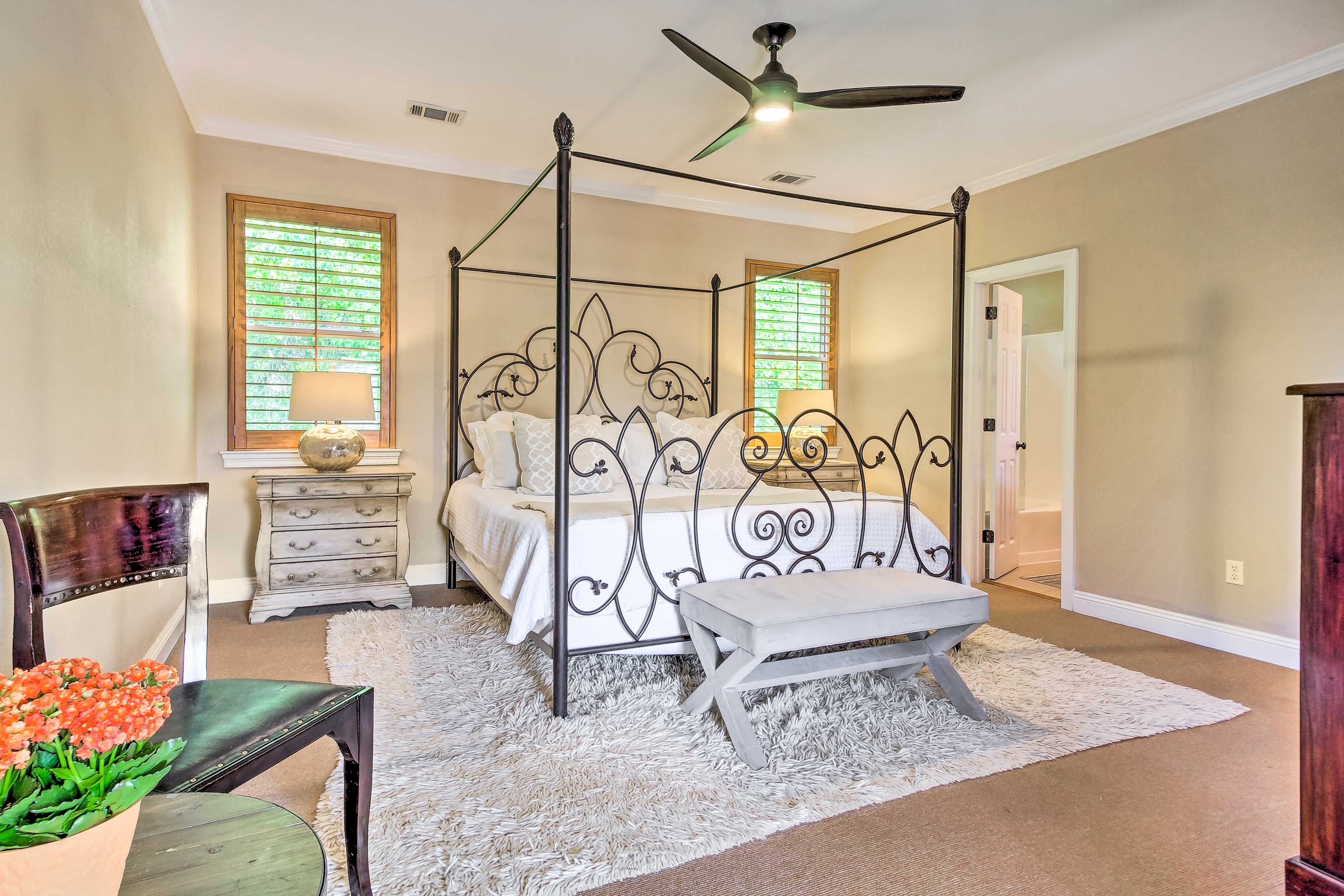 Two can claim this bedroom's California King Bed.