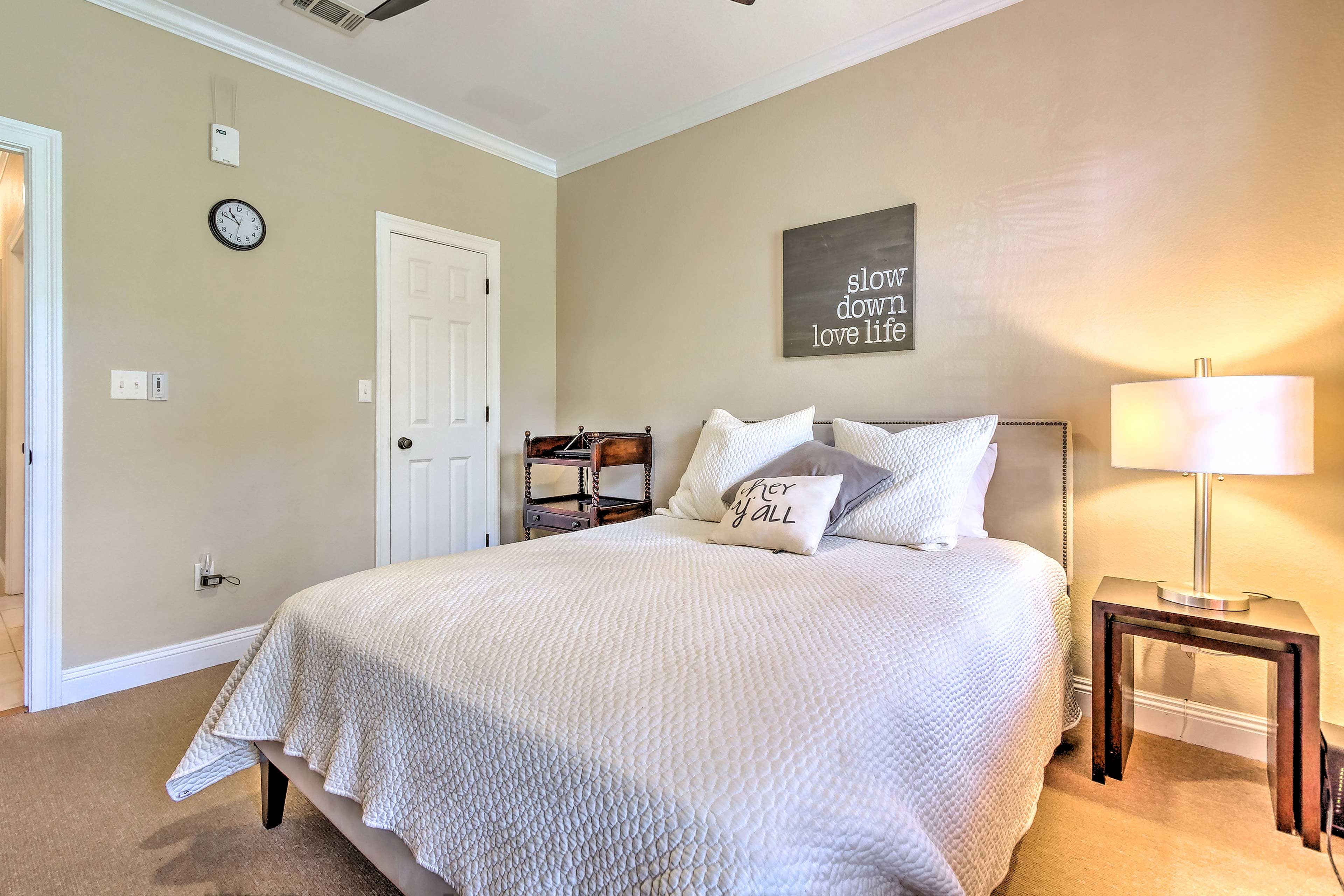 This bedroom also features a queen bed.