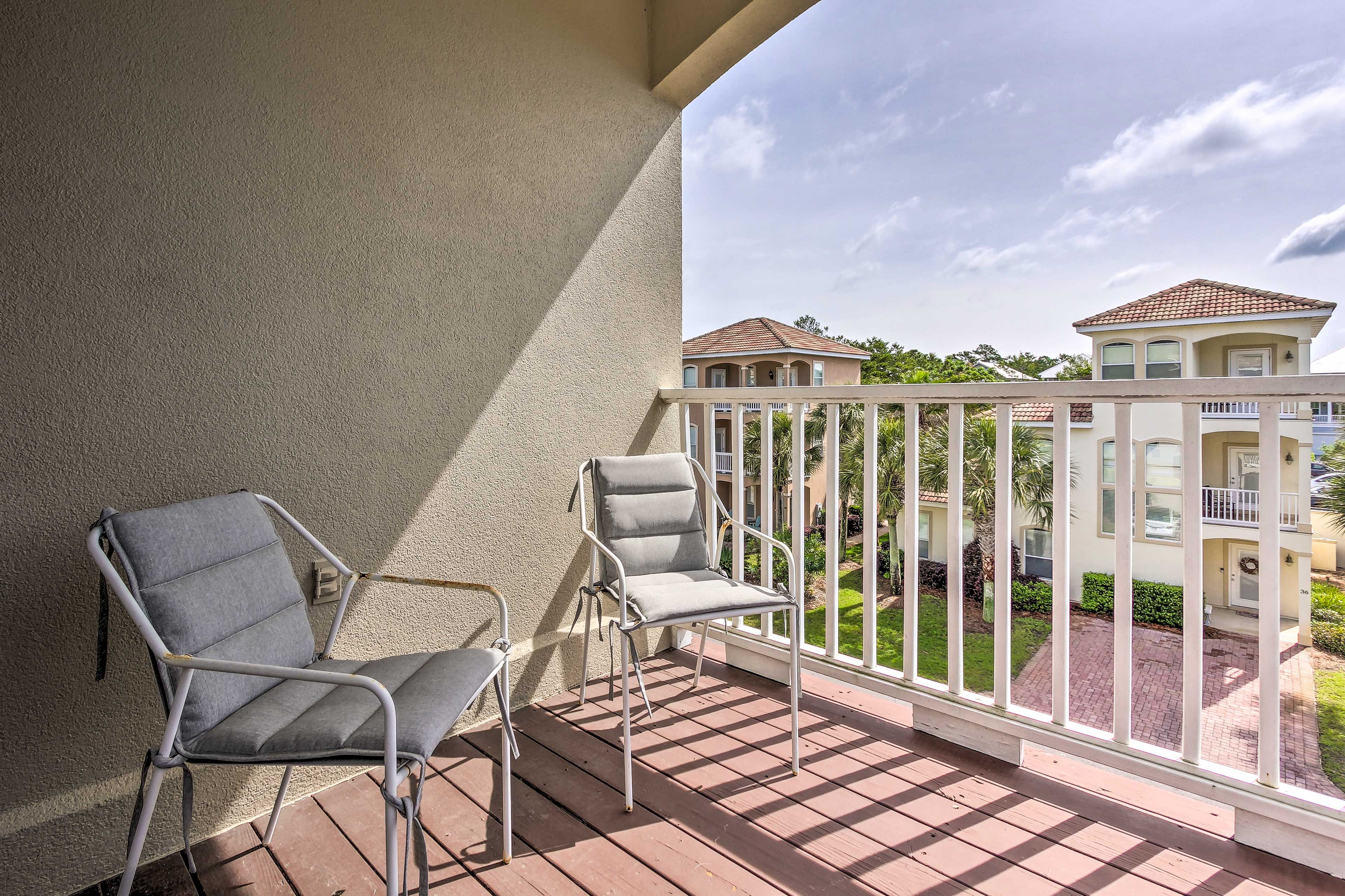 The home also features two balconies with seating.