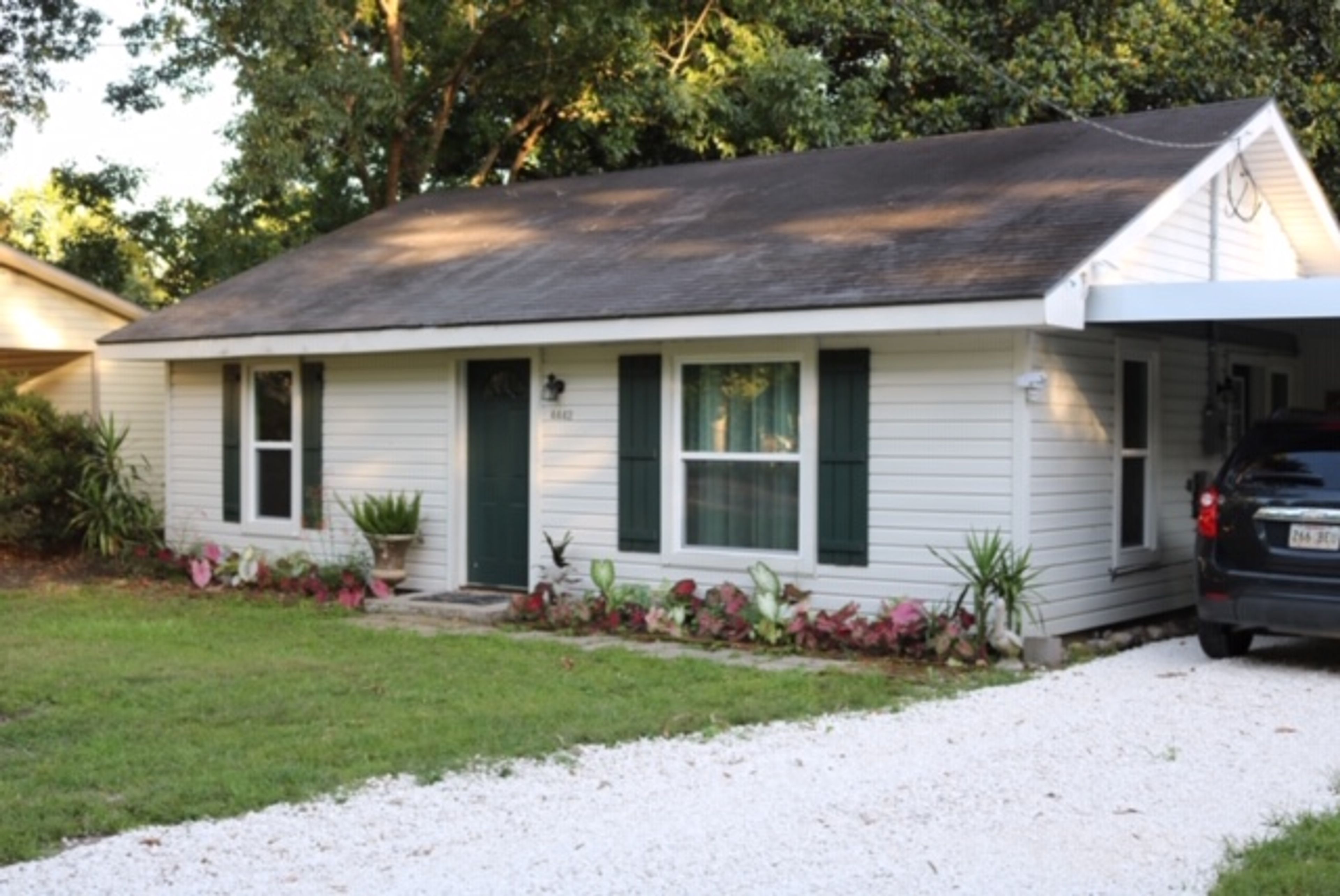 Parking | Driveway (3 Vehicles) | Carport (1 Vehicle) | Street Parking