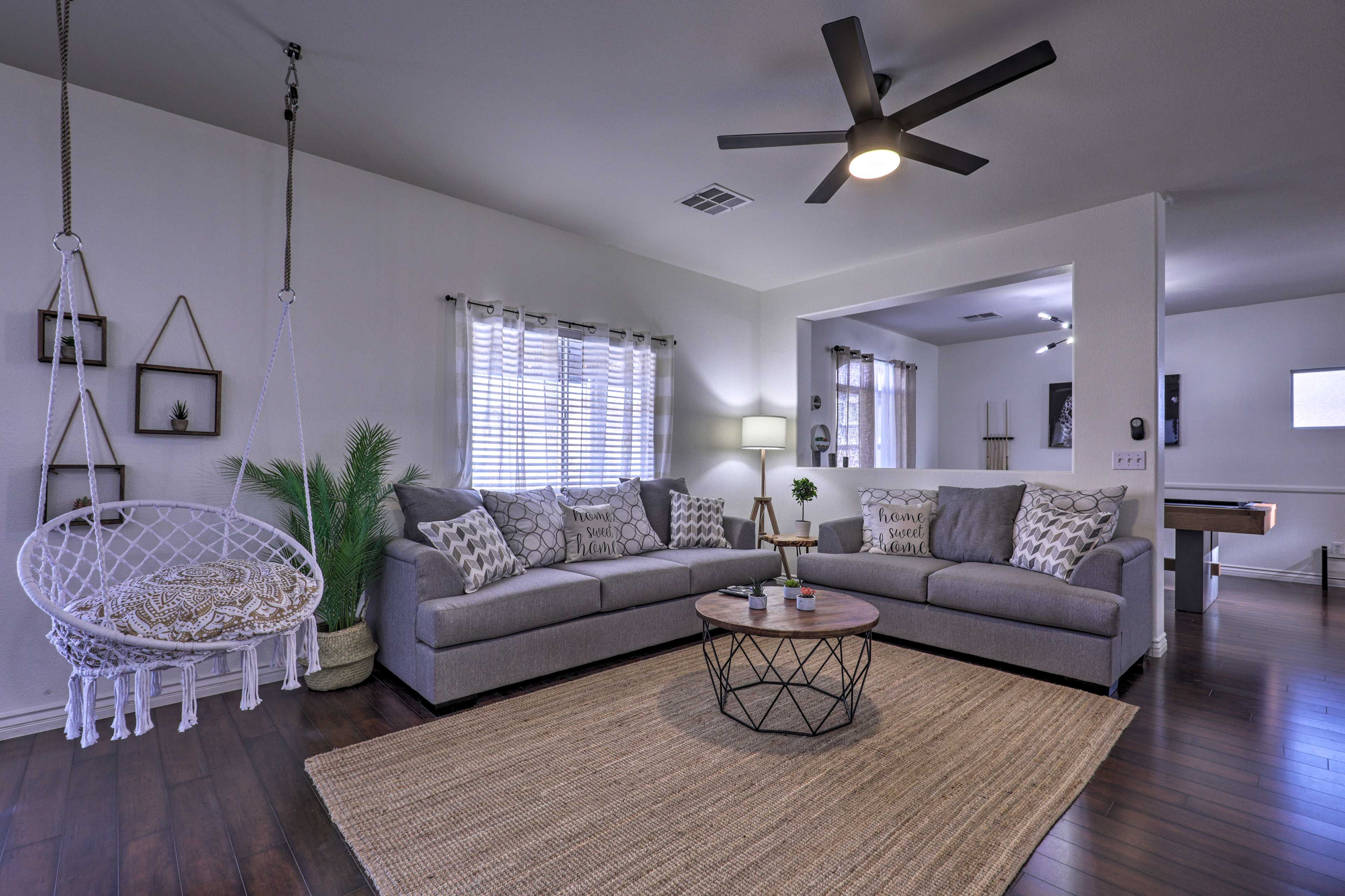 Relax on the couches or settle down in the swinging chair.