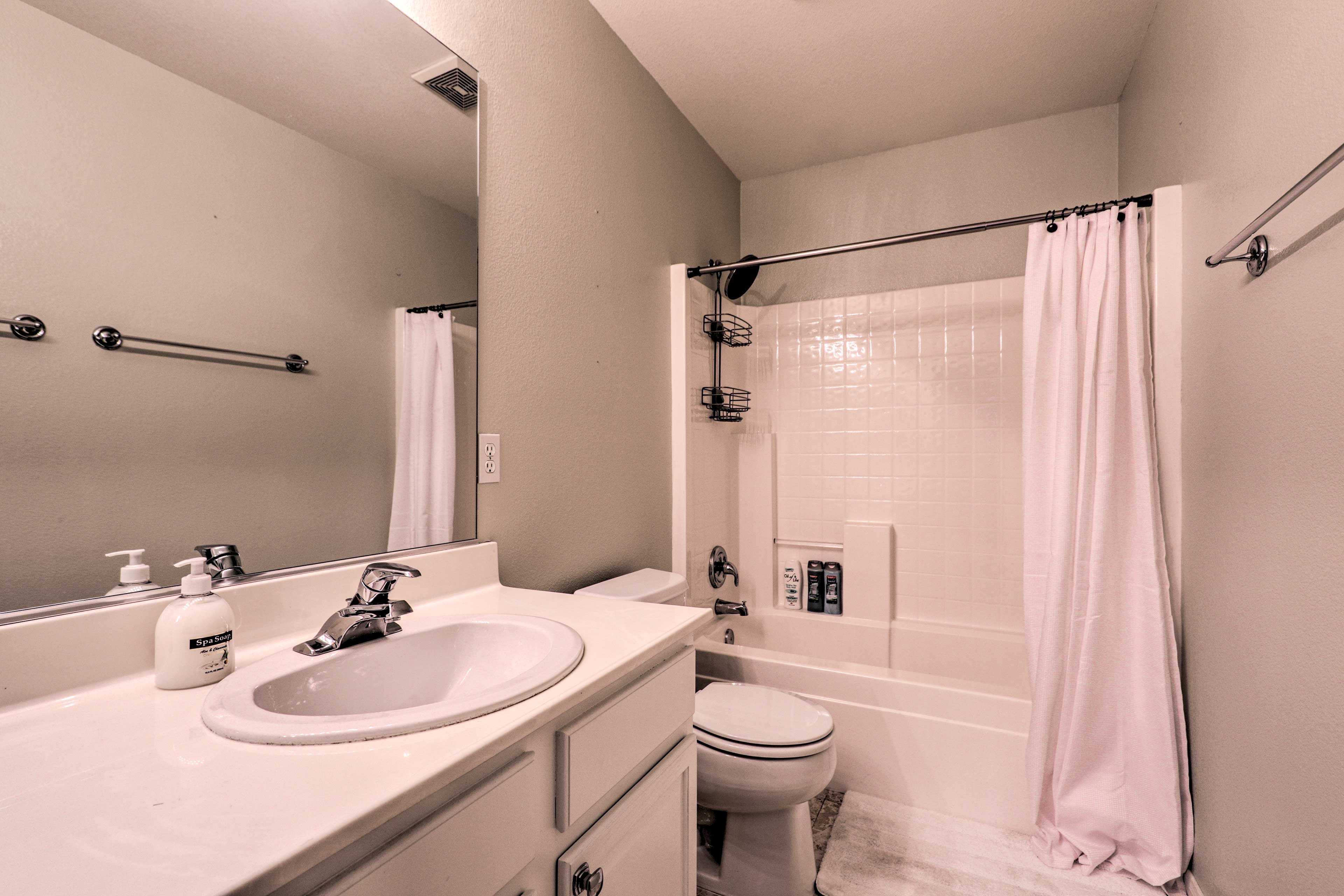The home offers 2 full bathrooms and 1 half bath.