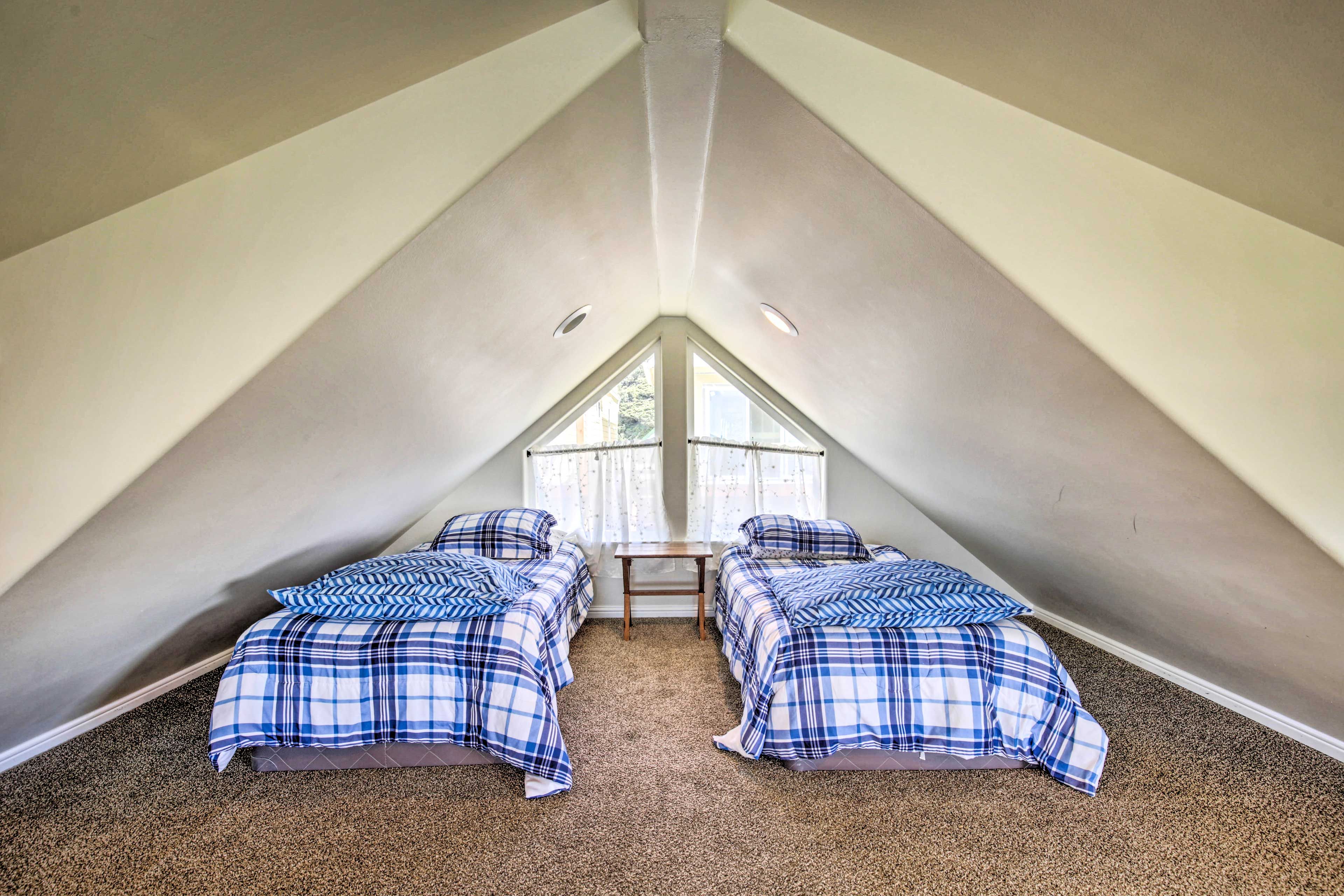 Two side-by-side twin beds are ideal for siblings & friends.