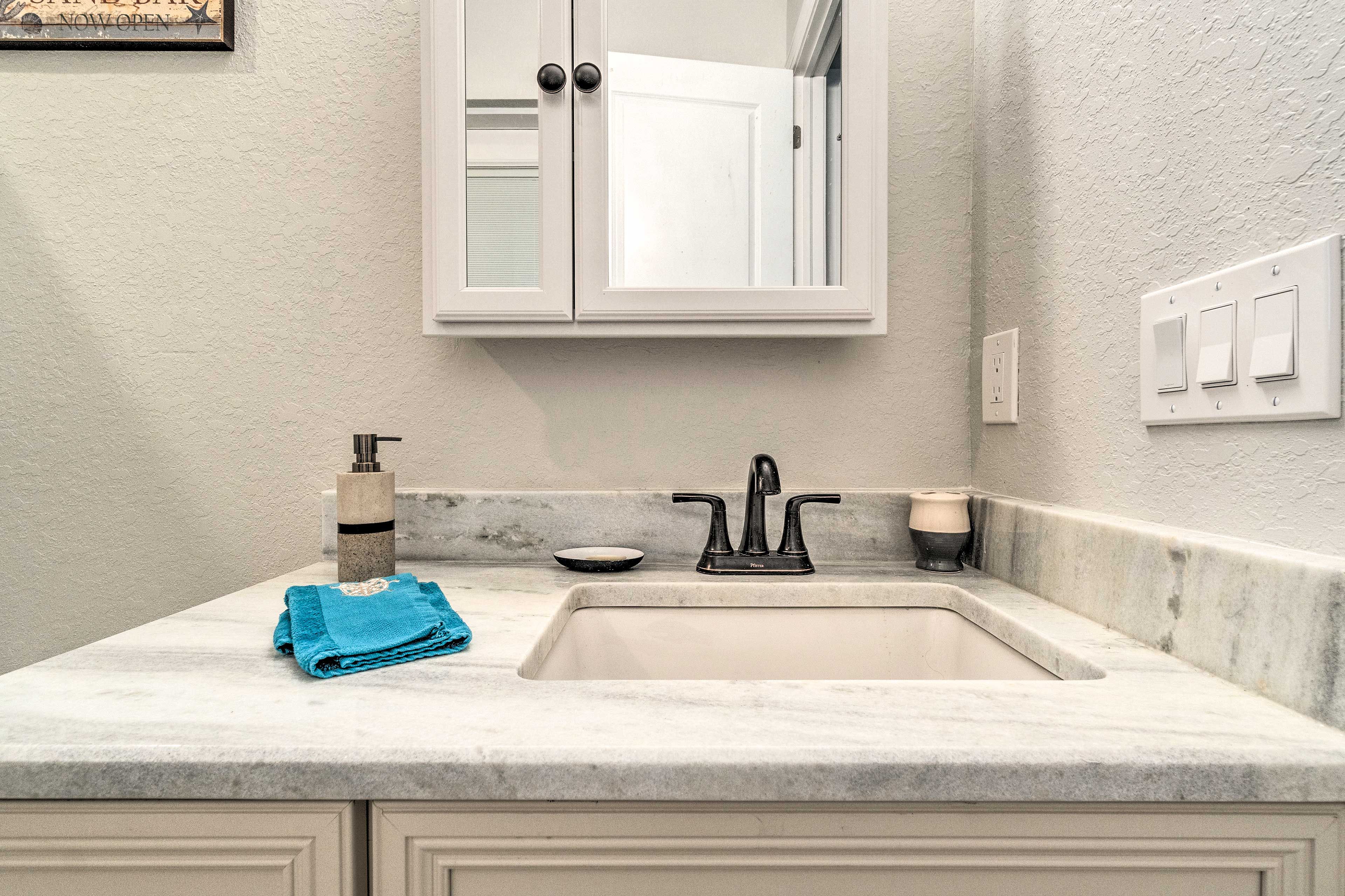 Keep your toiletries in the mirror.