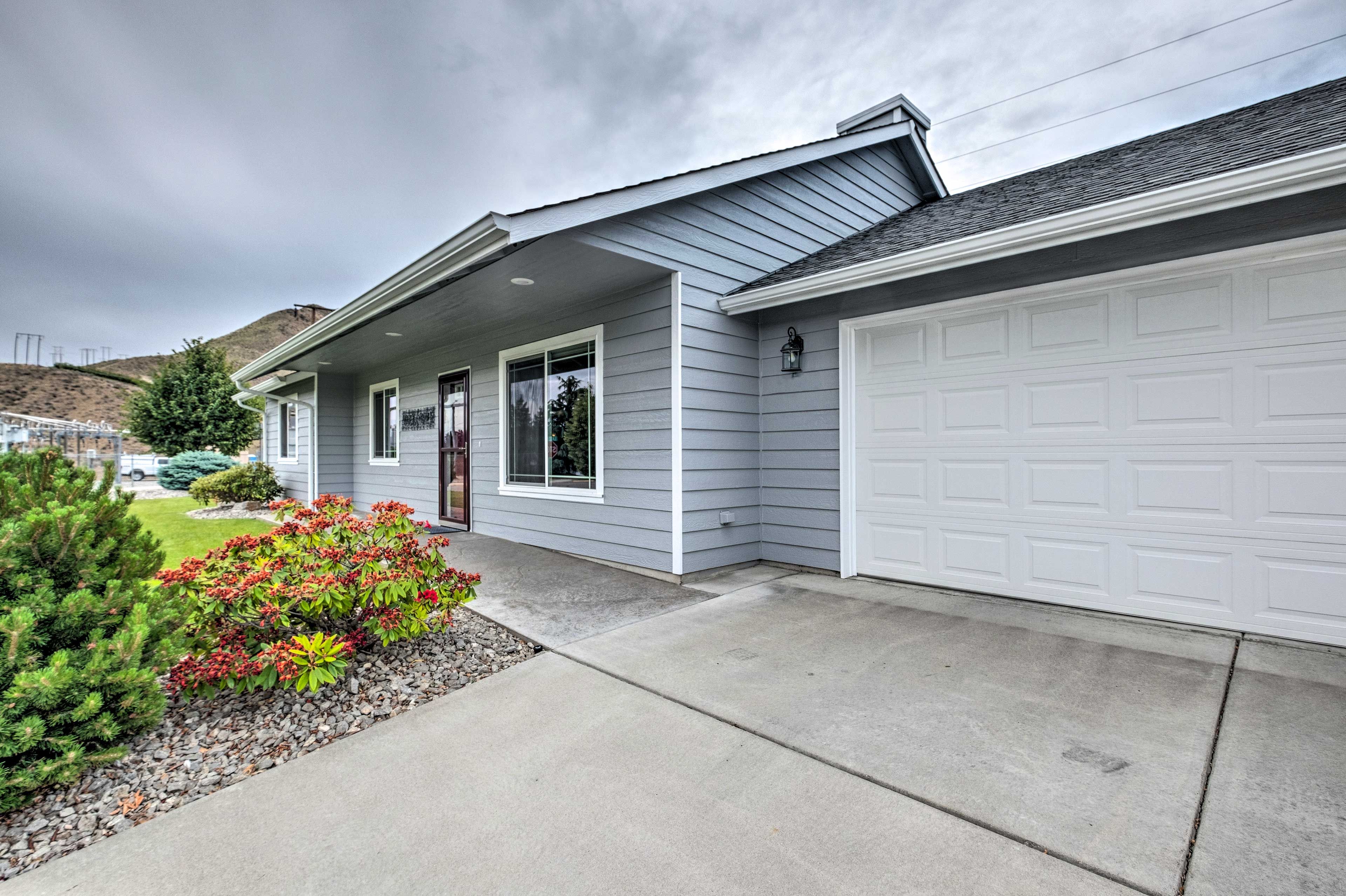 The 3-bedroom, 2-bath vacation rental features garage and driveway parking.