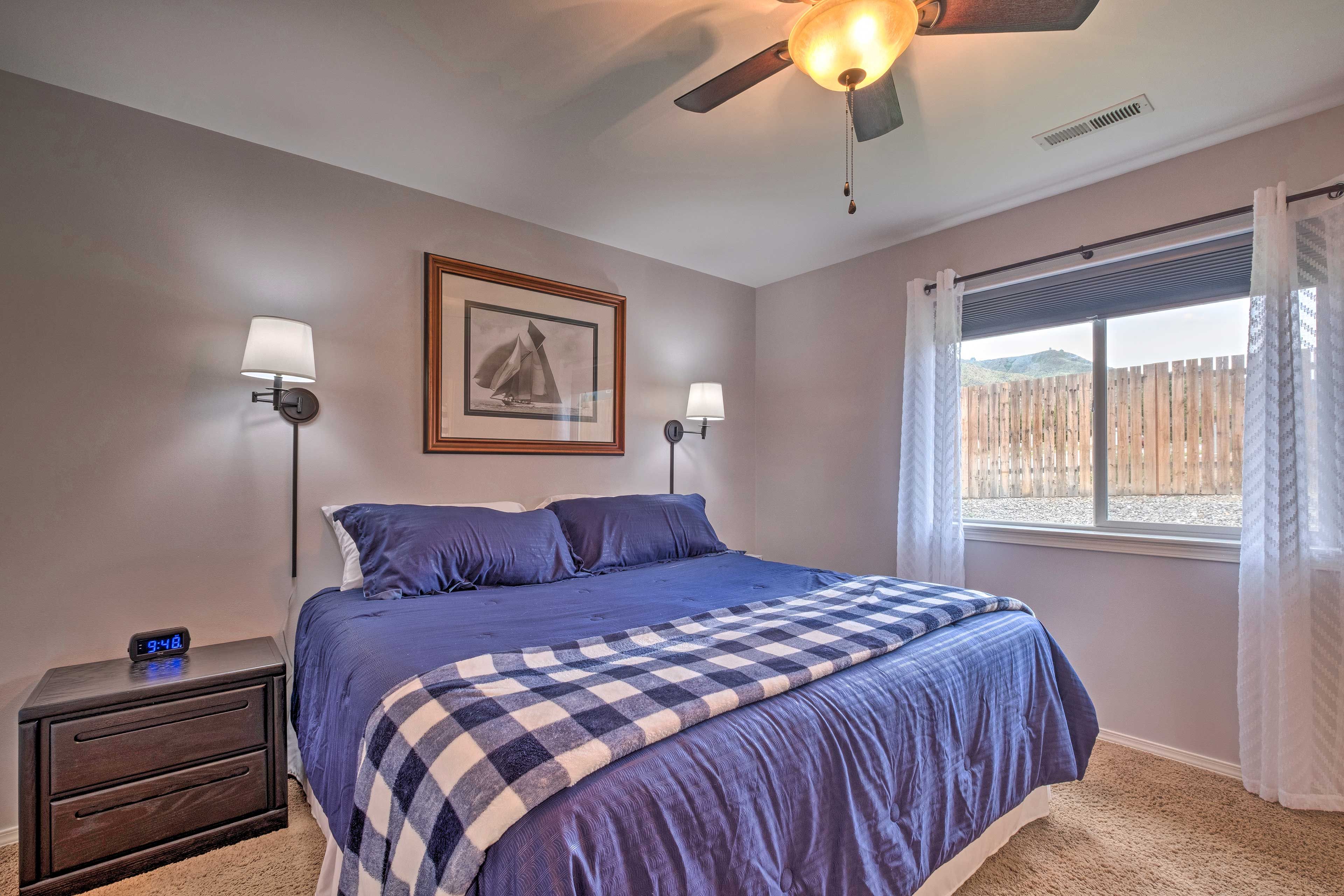 The first bedroom suite hosts a king bed for 2 lucky guests.