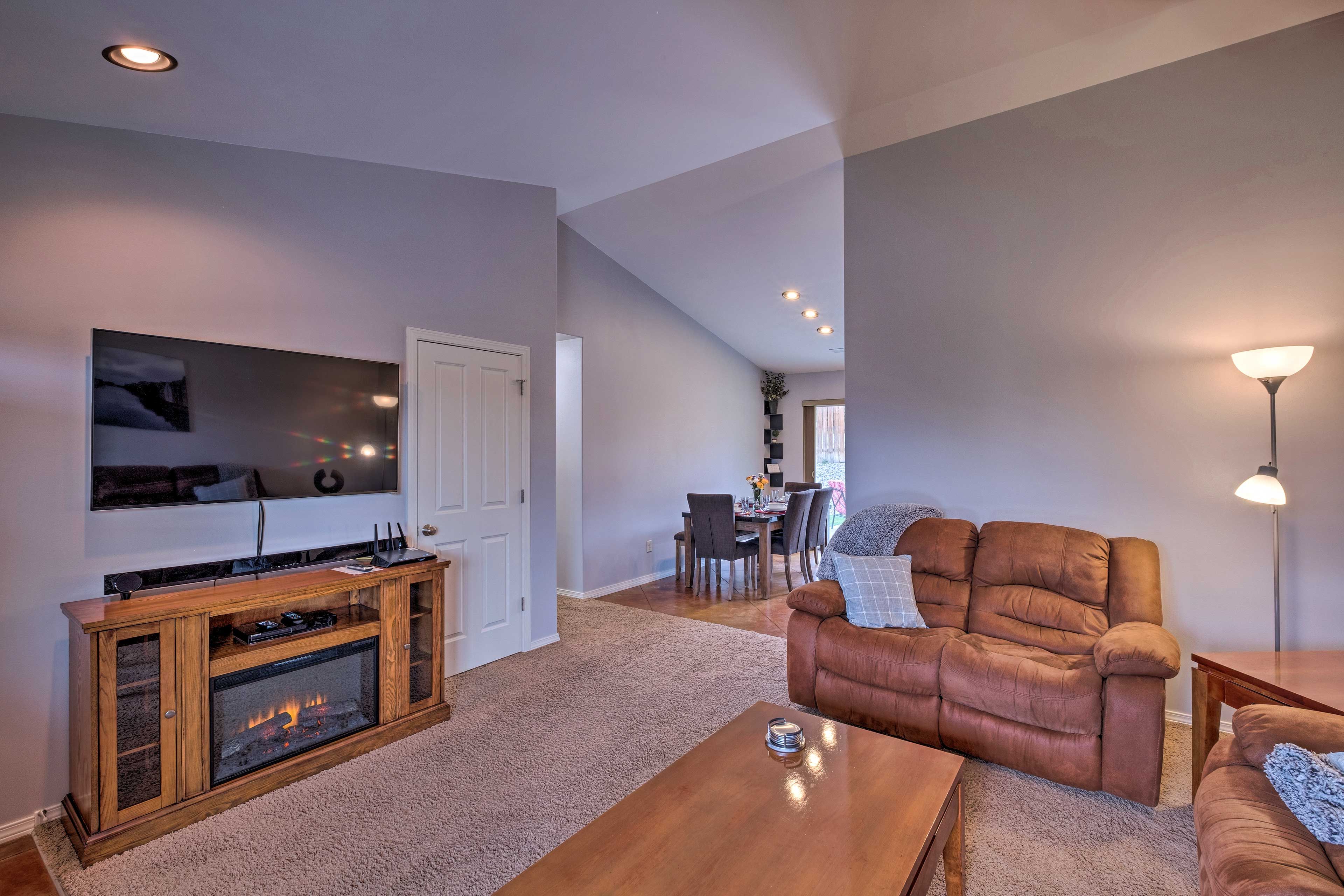 Cuddle up to the electric fireplace and Smart TV.