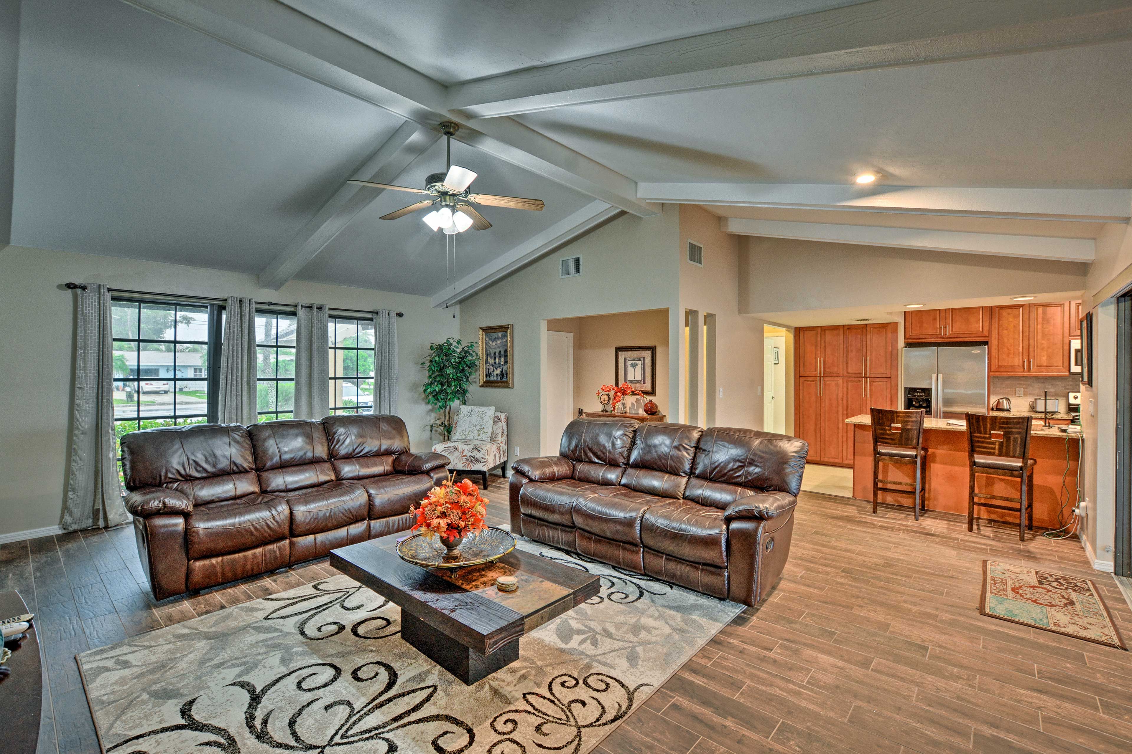 Watch a movie while you lounge in the reclining sofa.