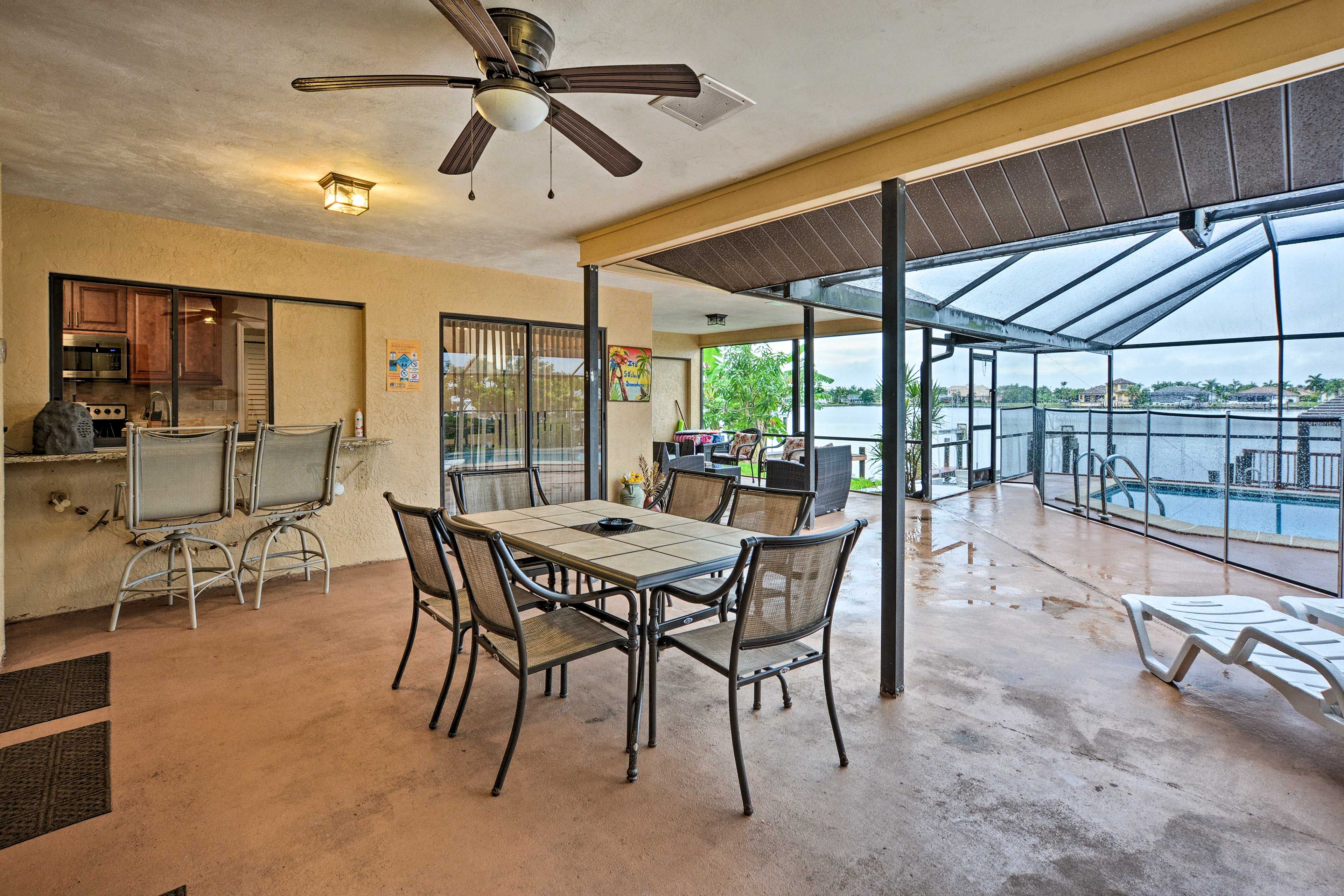 Sit at the outdoor bar and sip a cocktail for happy hour.