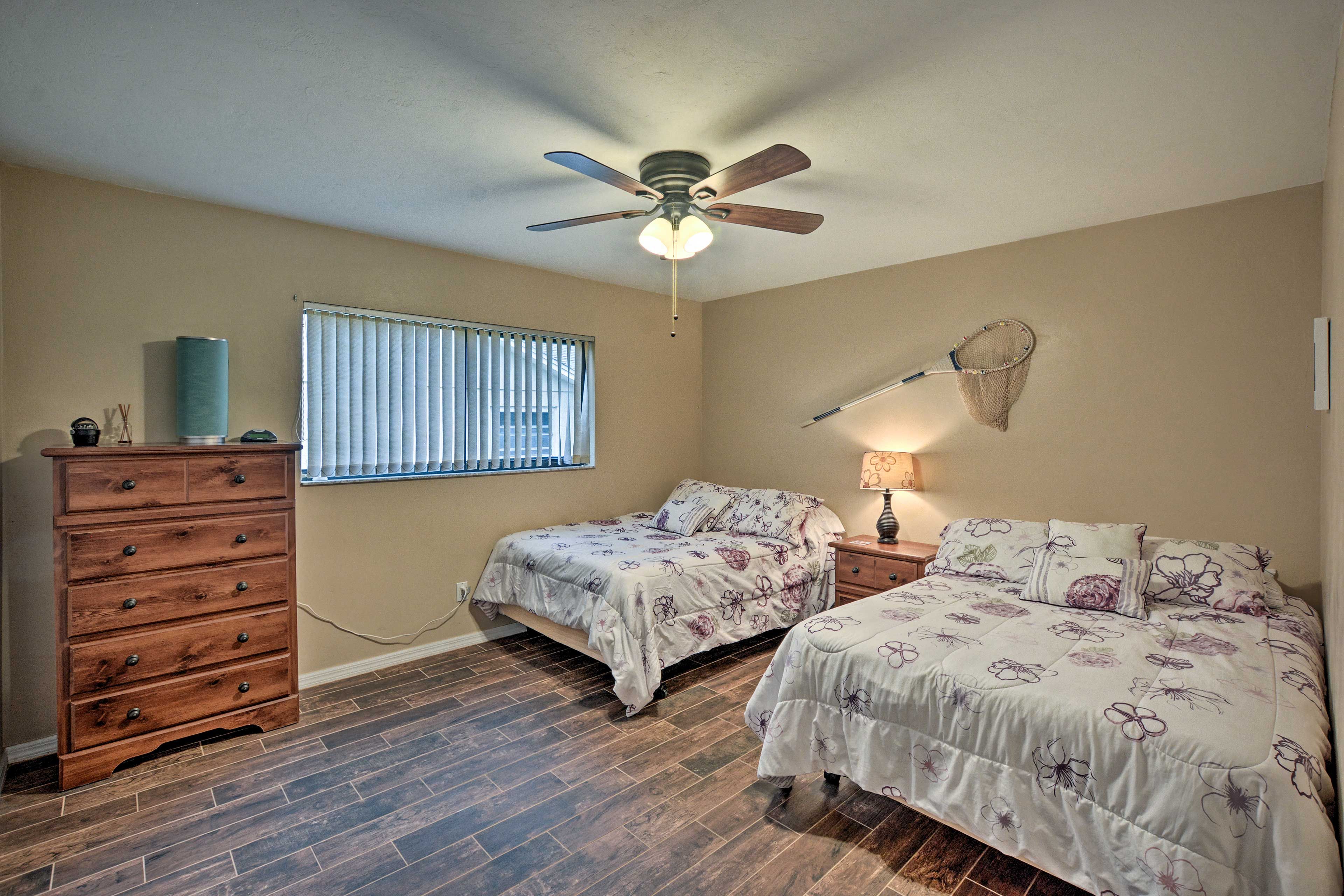 The third bedroom features 2 full-sized beds.