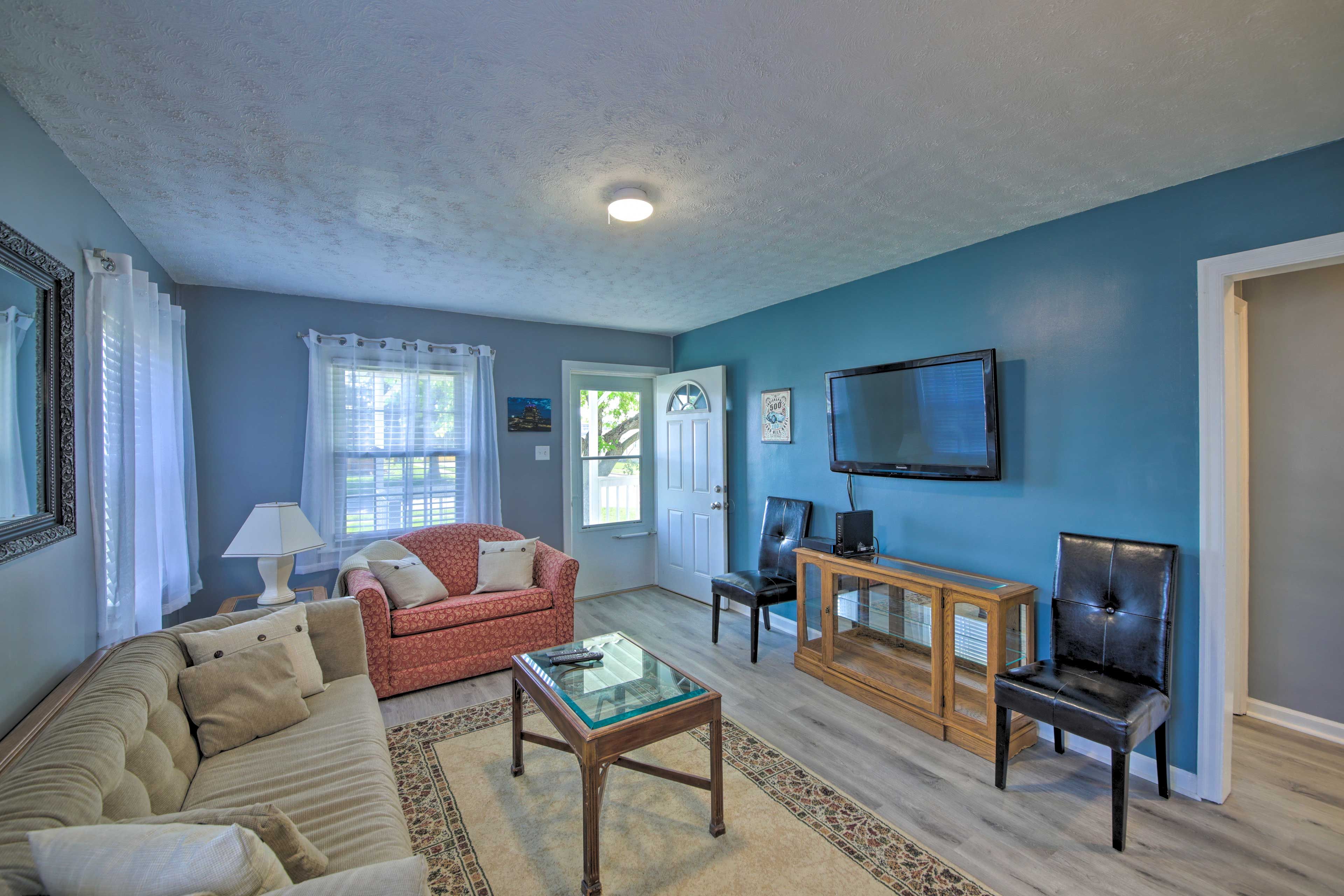 Living Room | Red Sleeper Chair | 1st Floor | Central A/C | Free WiFi