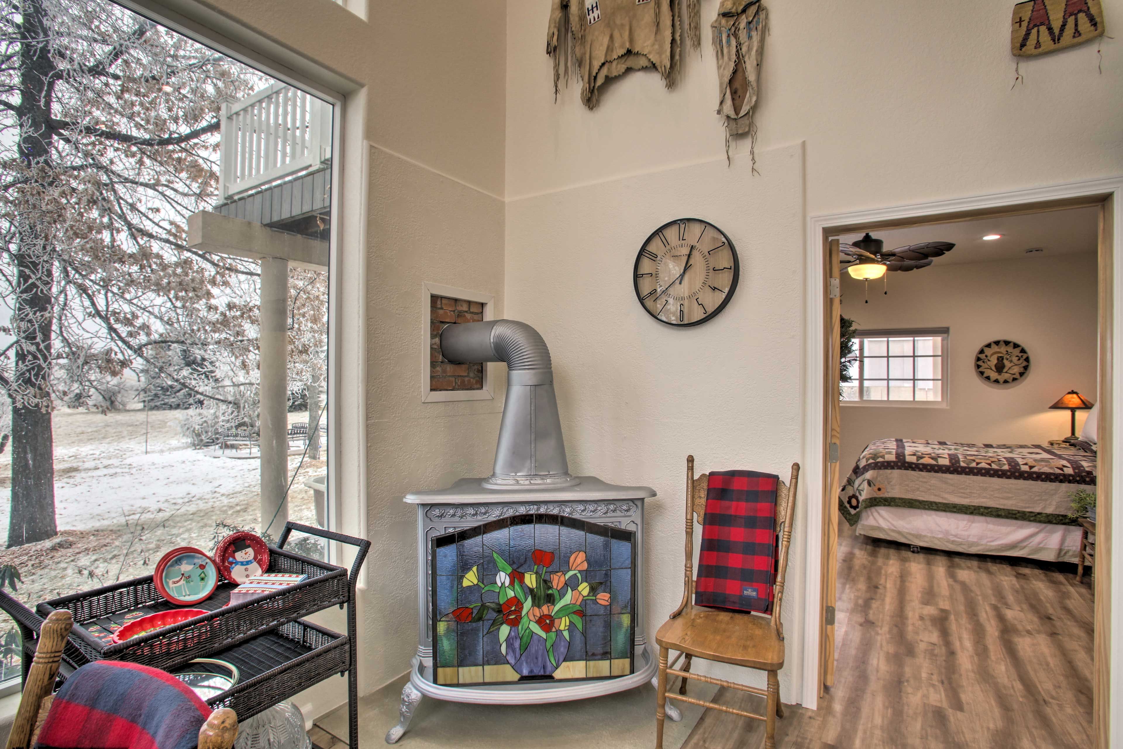 Main Living Space | Decorative Stove | Bedroom on Ground Floor