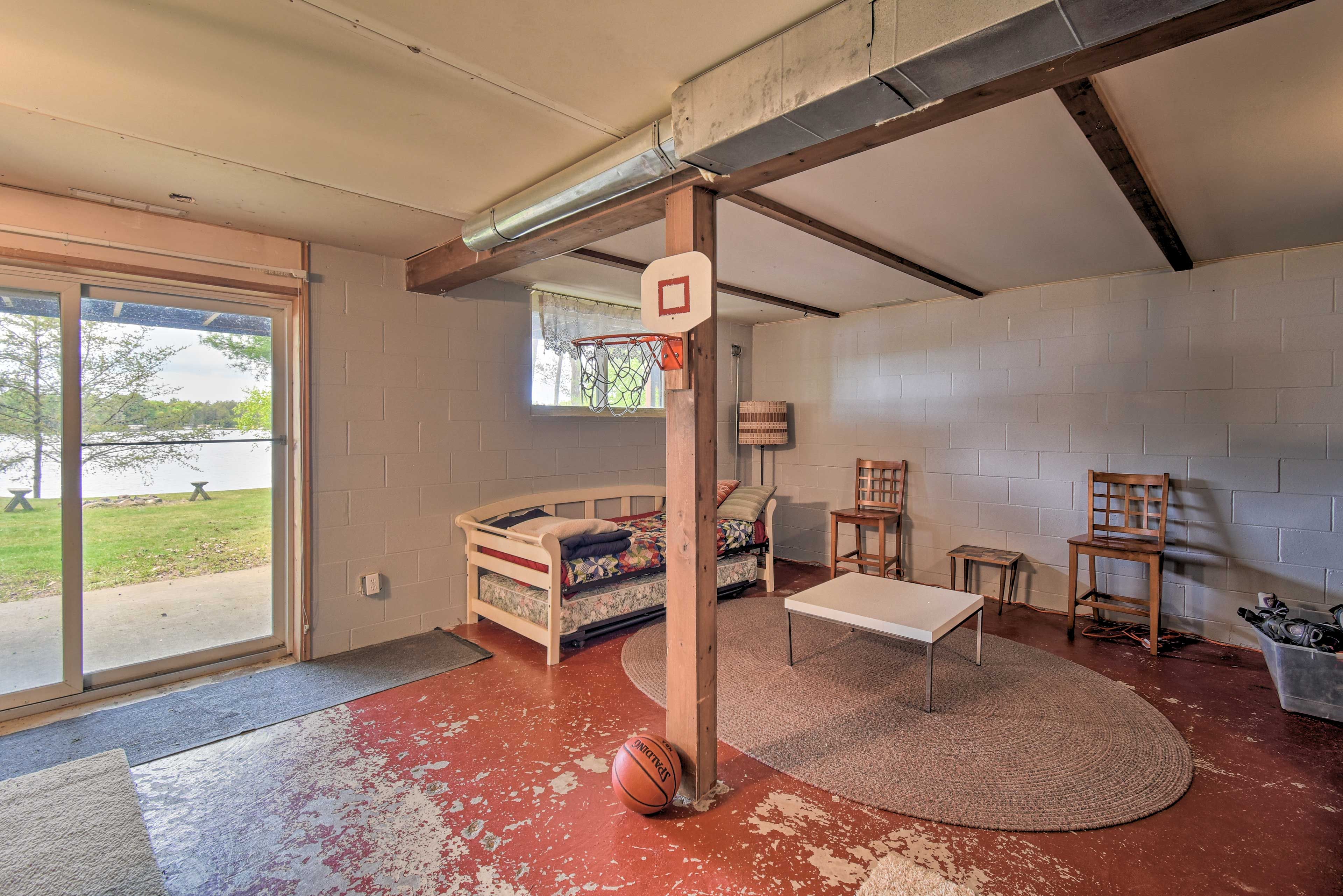 Head to the basement for additional sleeping on the day bed.