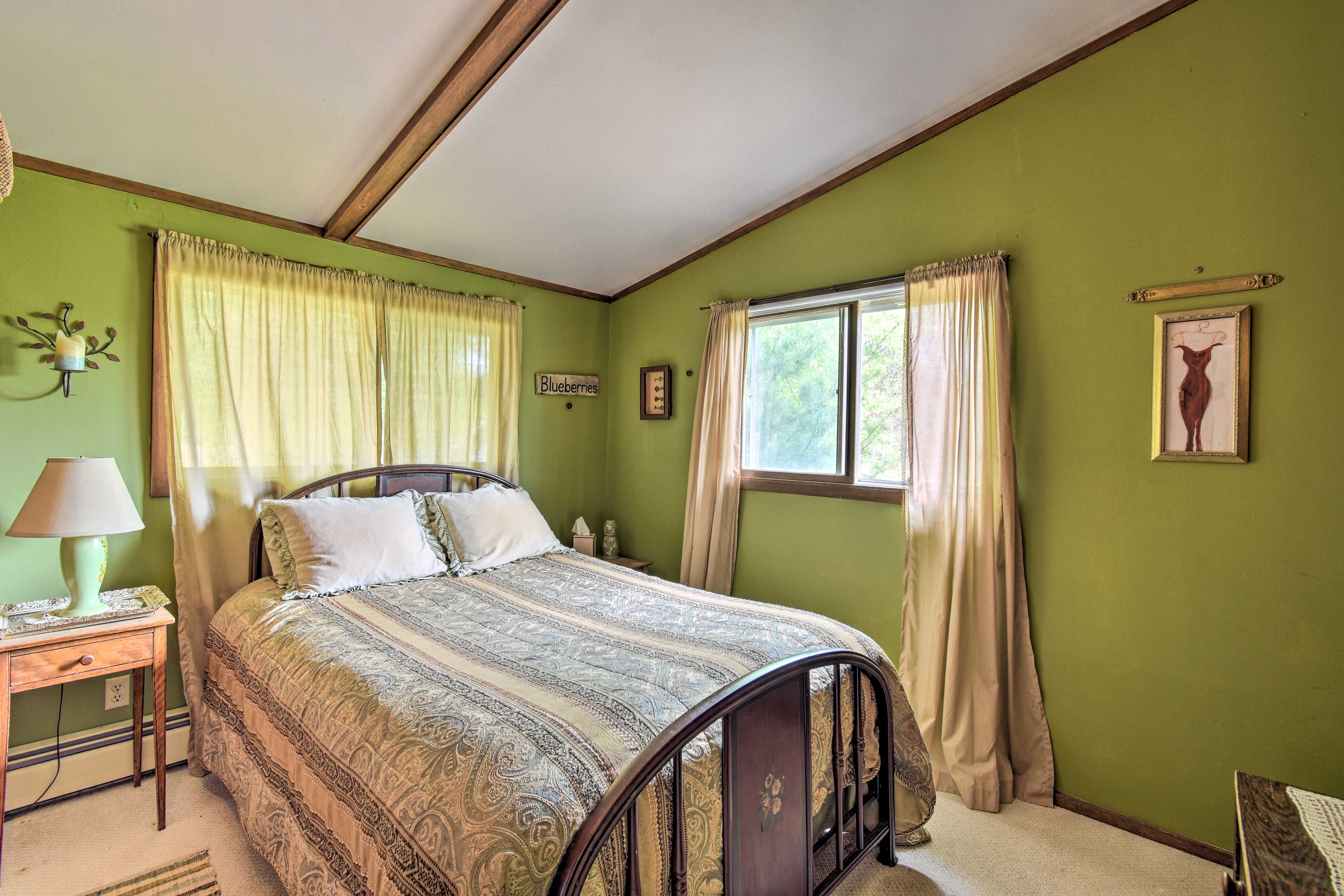 The third bedroom has a queen-sized bed.