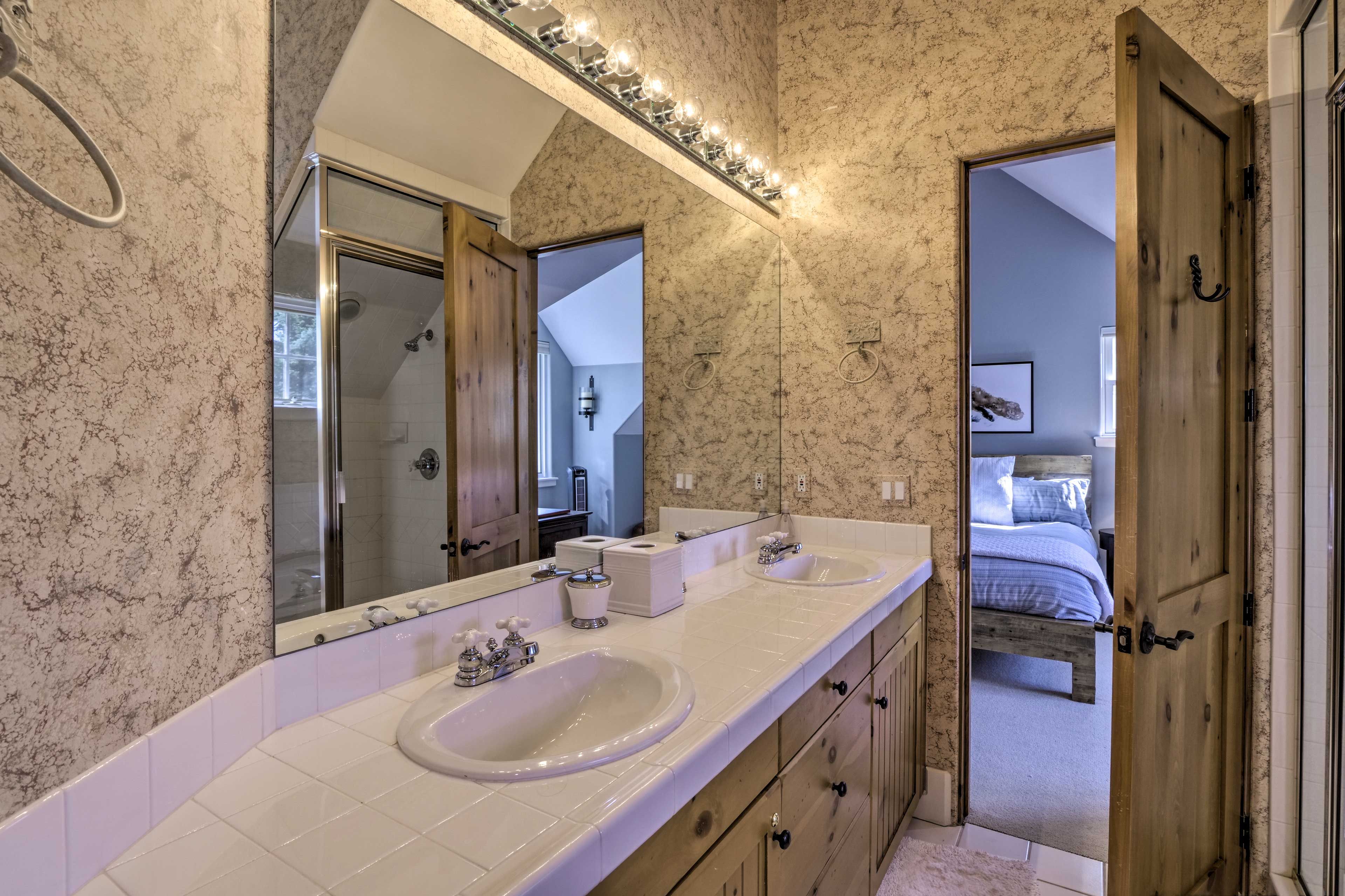 The en-suite bath also includes a double vanity.