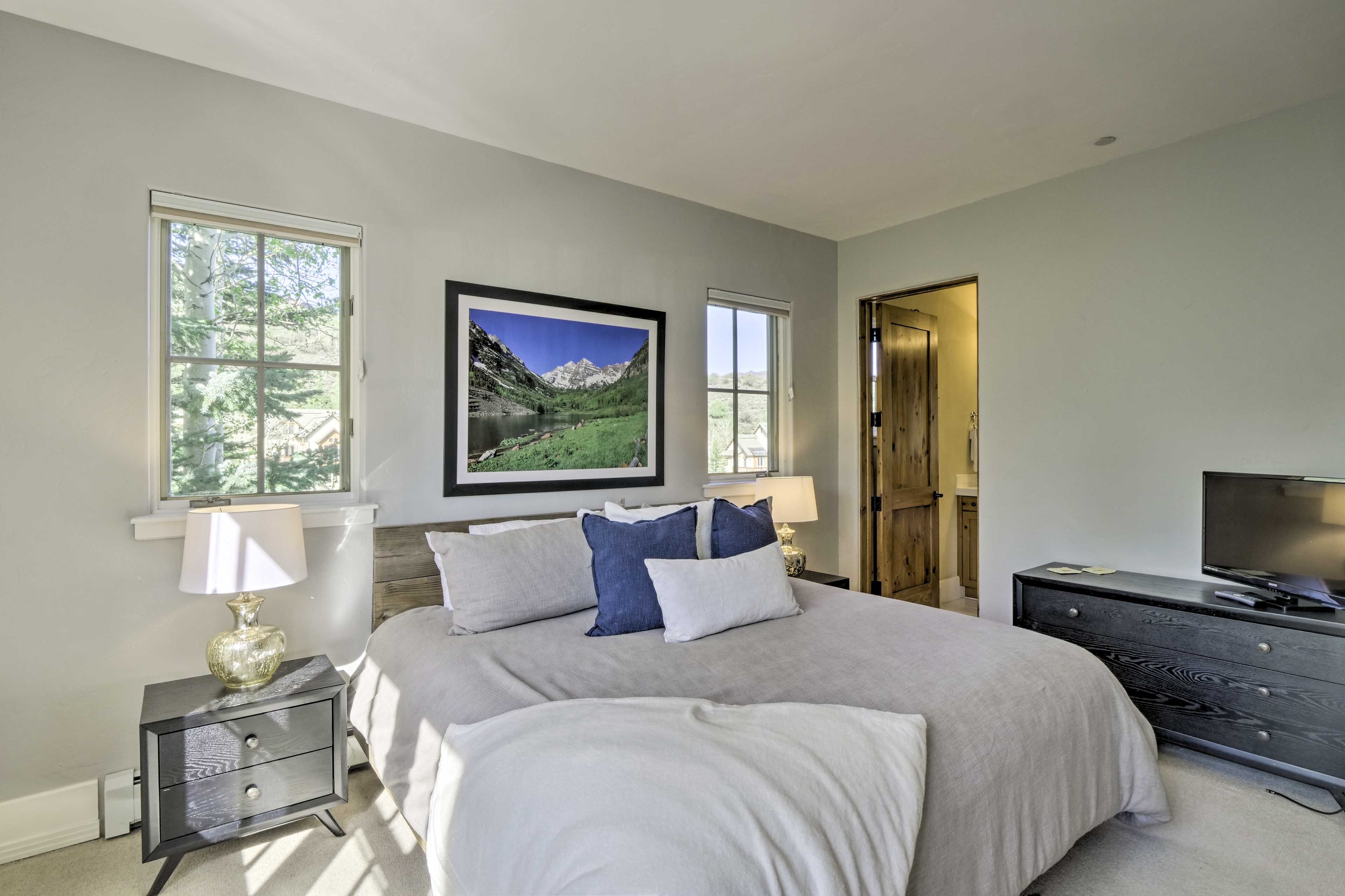 This first room houses a king bed and flat-screen Smart TV.