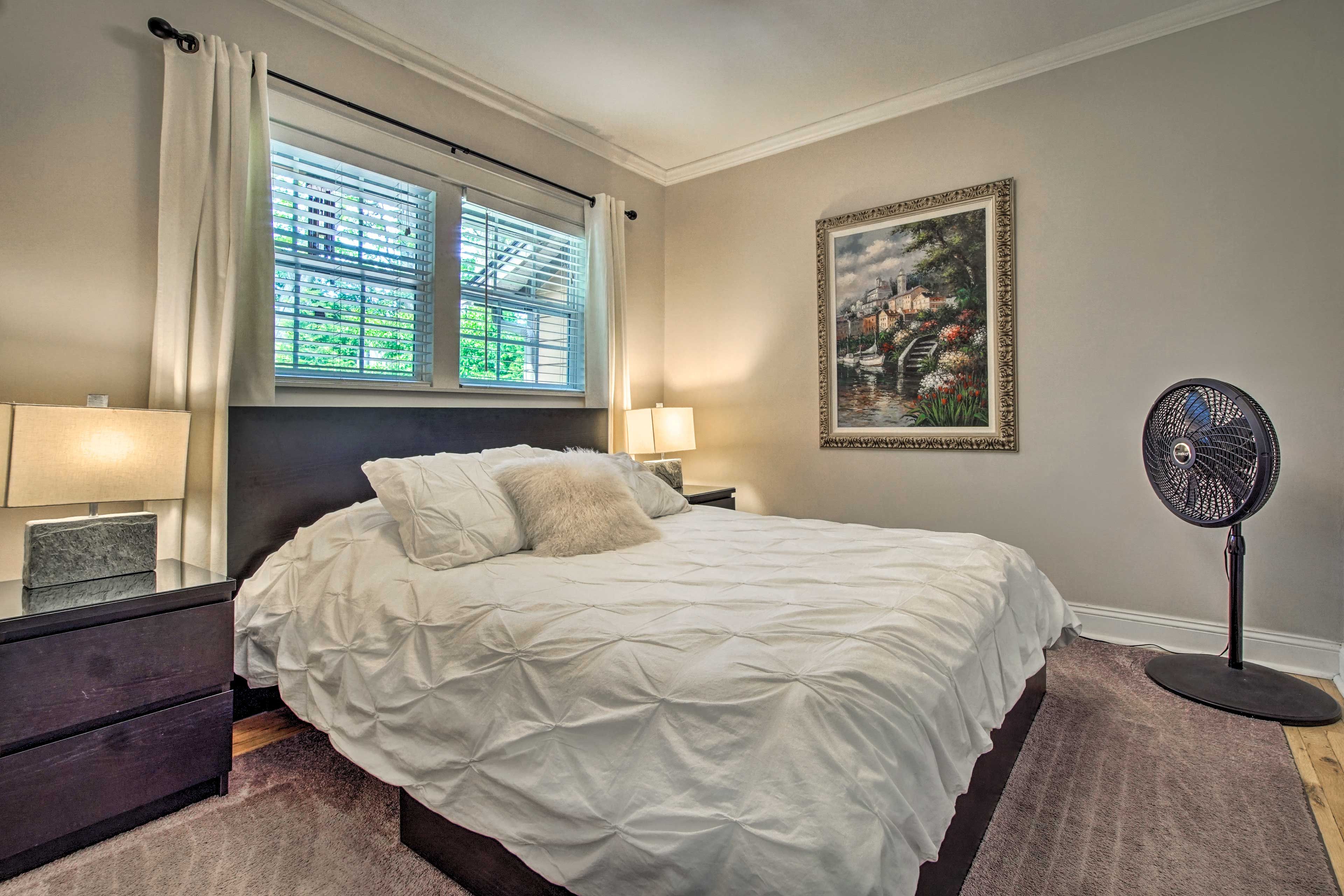 Two can sleep on the queen bed in this bedroom.