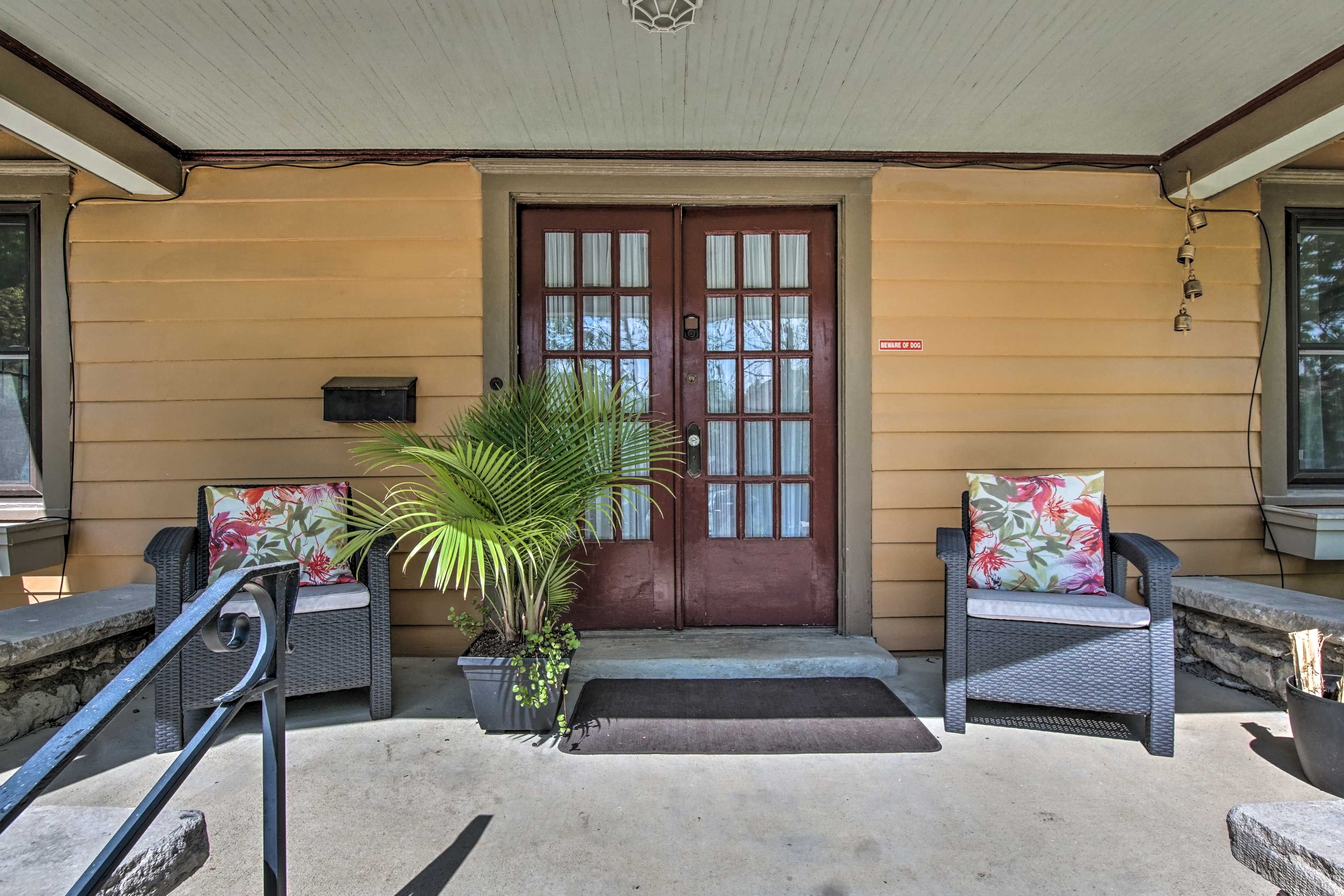 Find additional outdoor seating on the covered front porch.