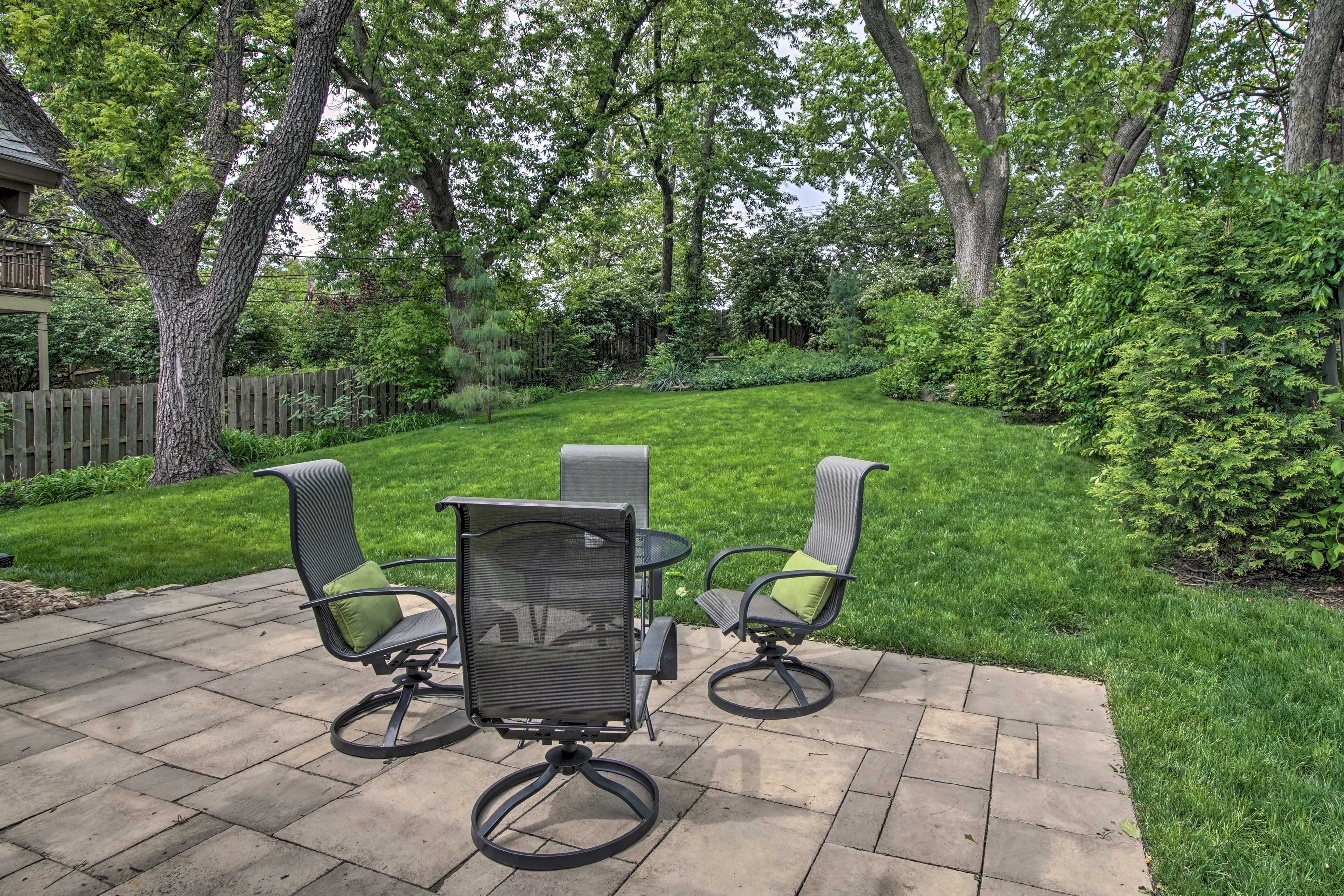 The lush yard offers an oasis from city living.