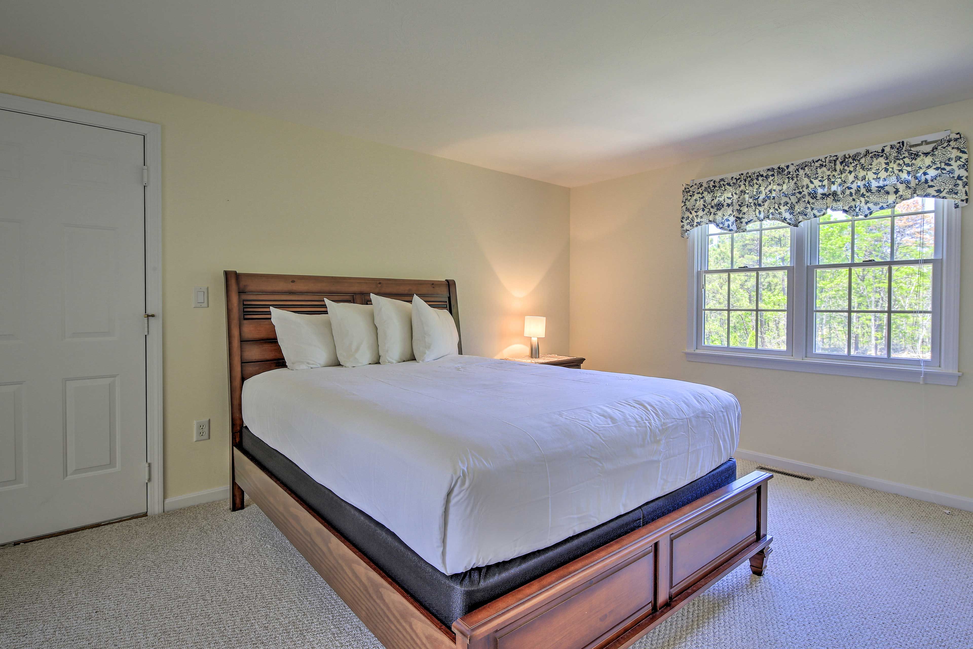 Most of the bedrooms feature queen-sized beds, while the first bedroom has a king bed.