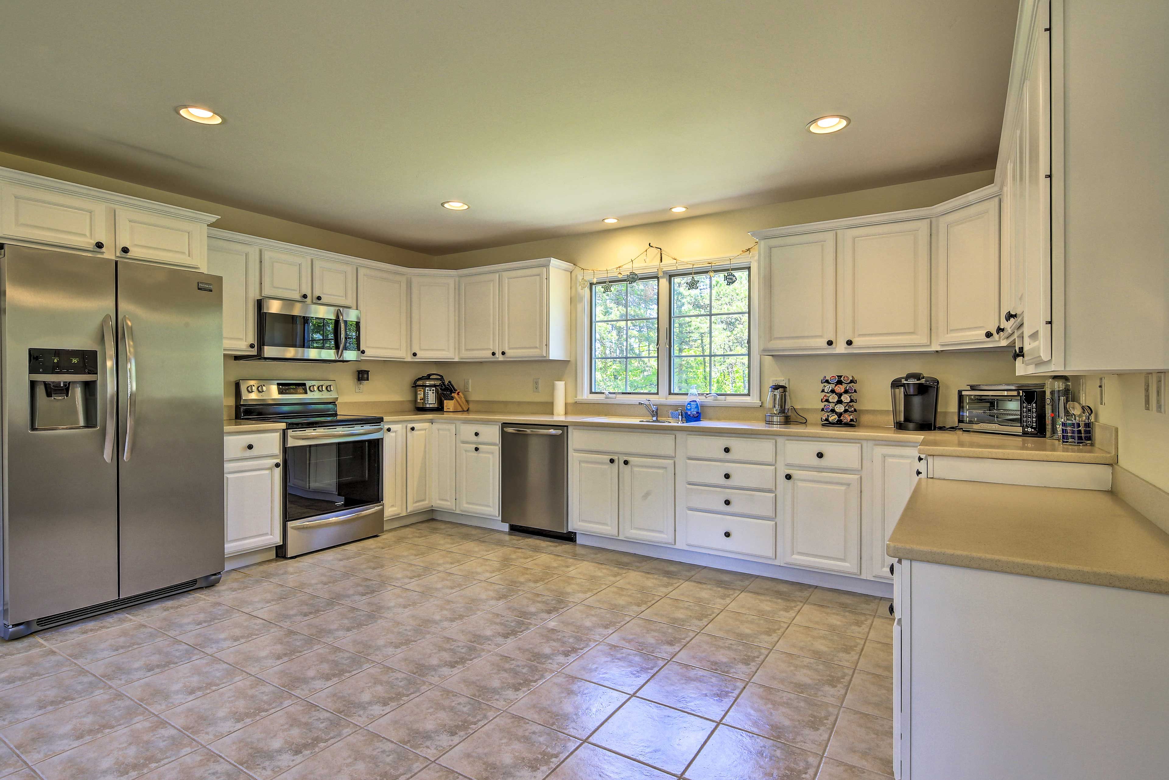 This kitchen features all of the bells and whistles, like a Crock-Pot & Keurig!