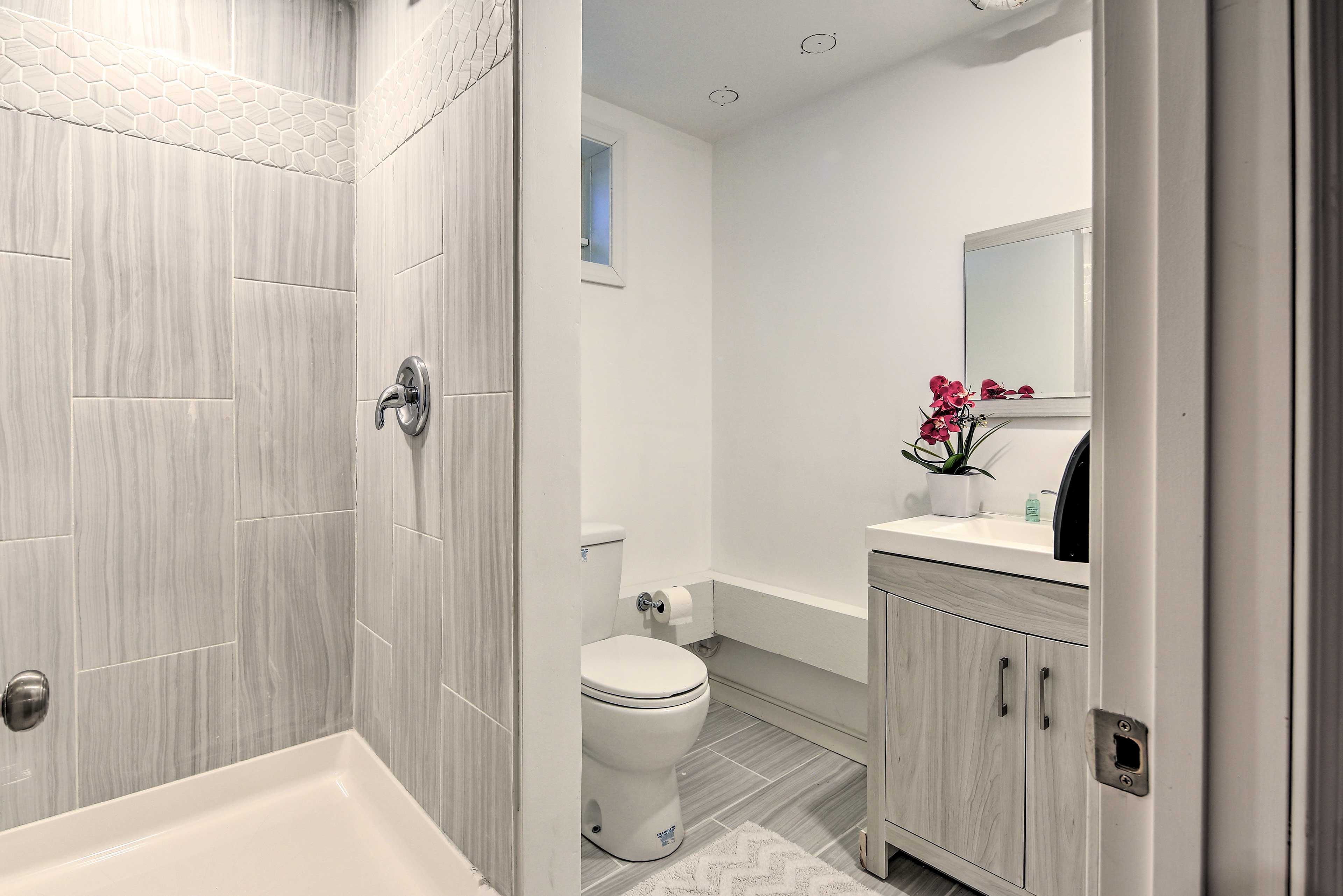 One bedroom and full bathroom are located in the basement of the home.