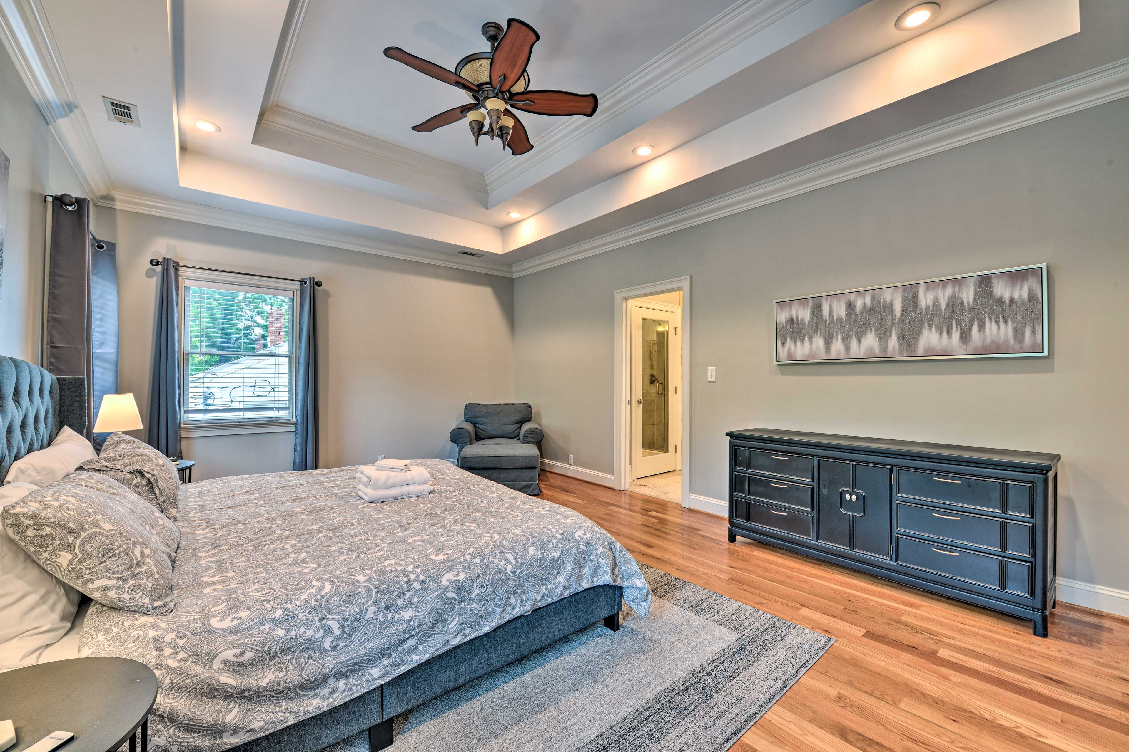The master bedroom features a spacious king bed.