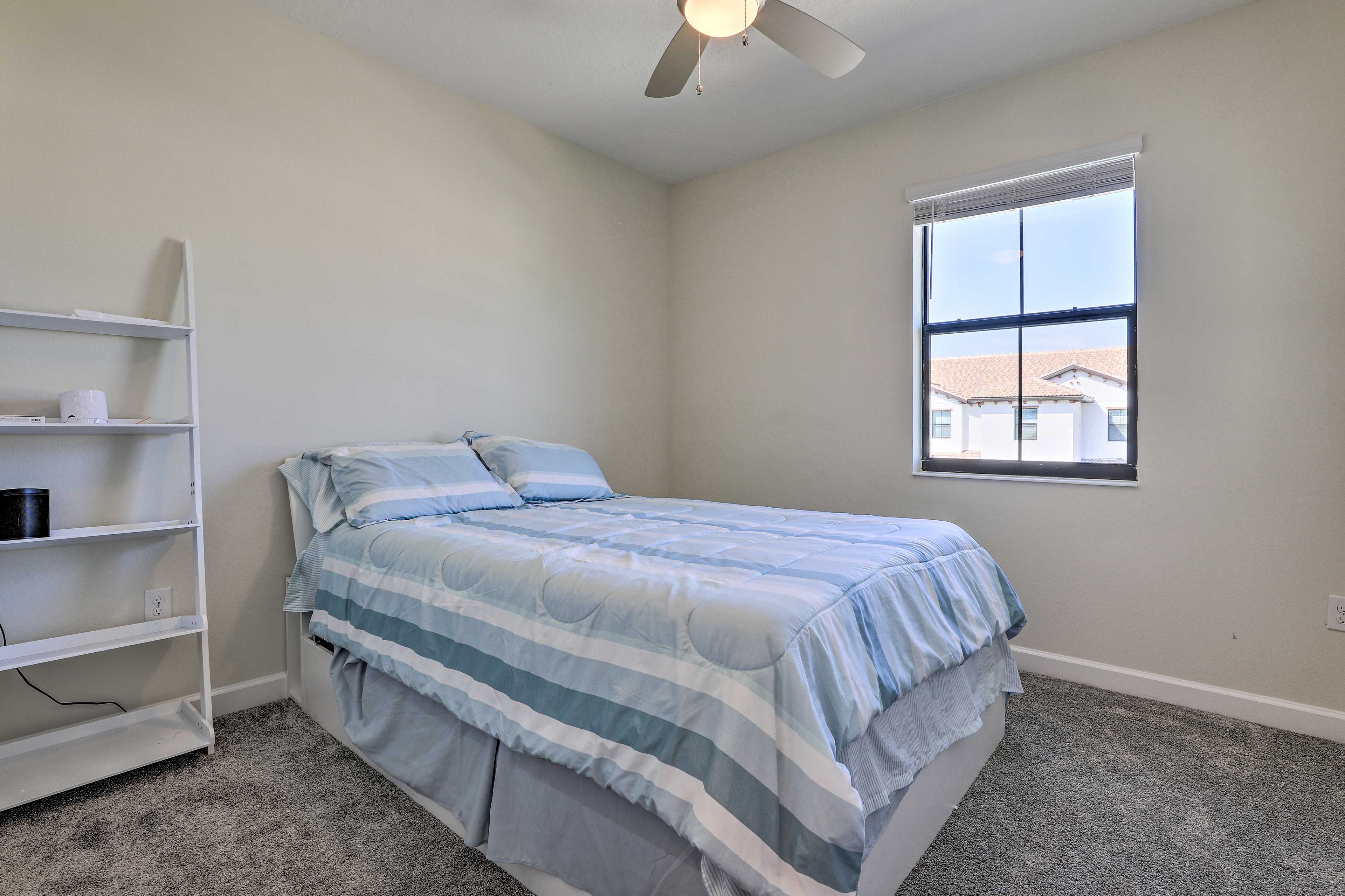 Another queen bed is in bedroom 2.