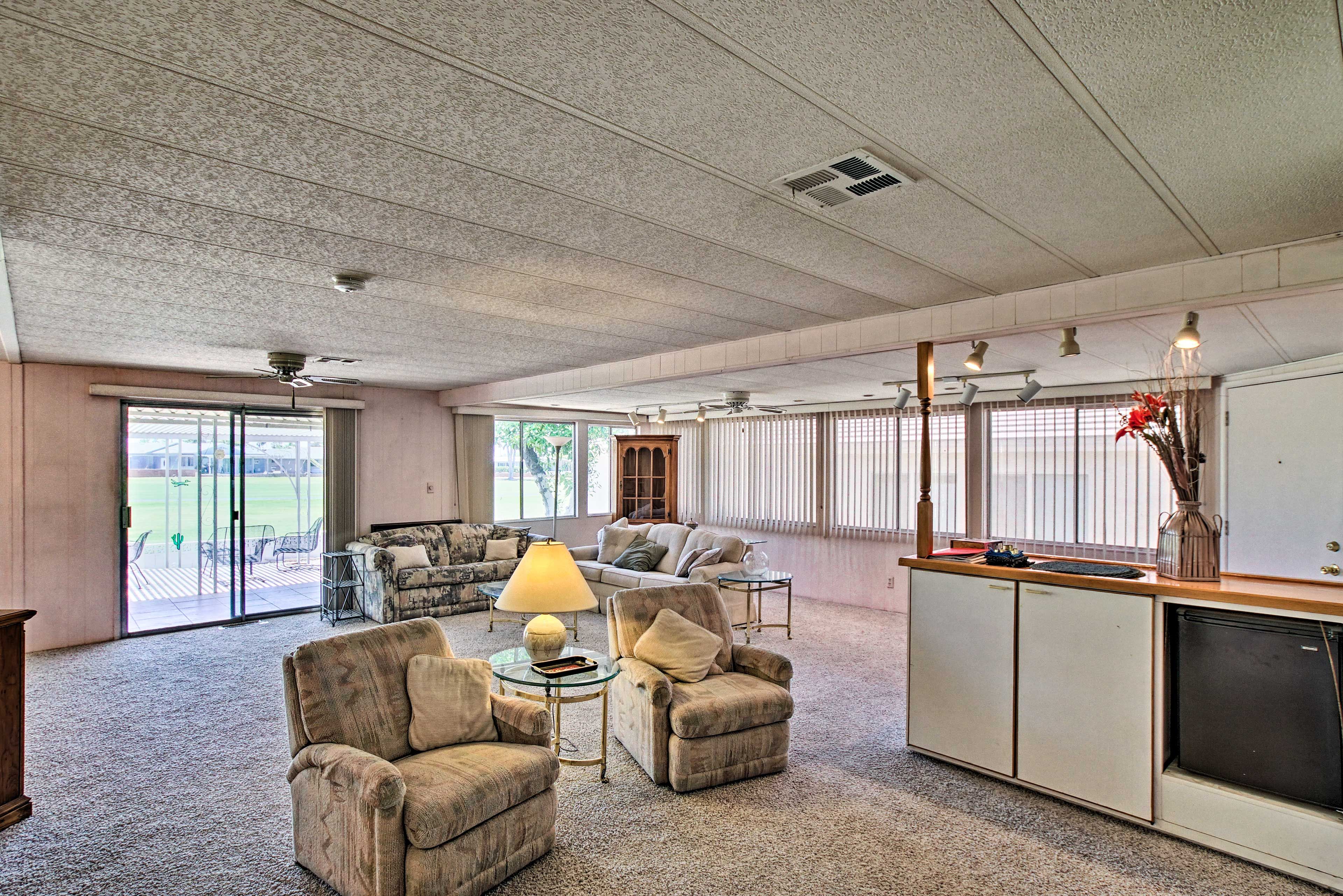 This living room features a bar area for your happy hour cocktail!