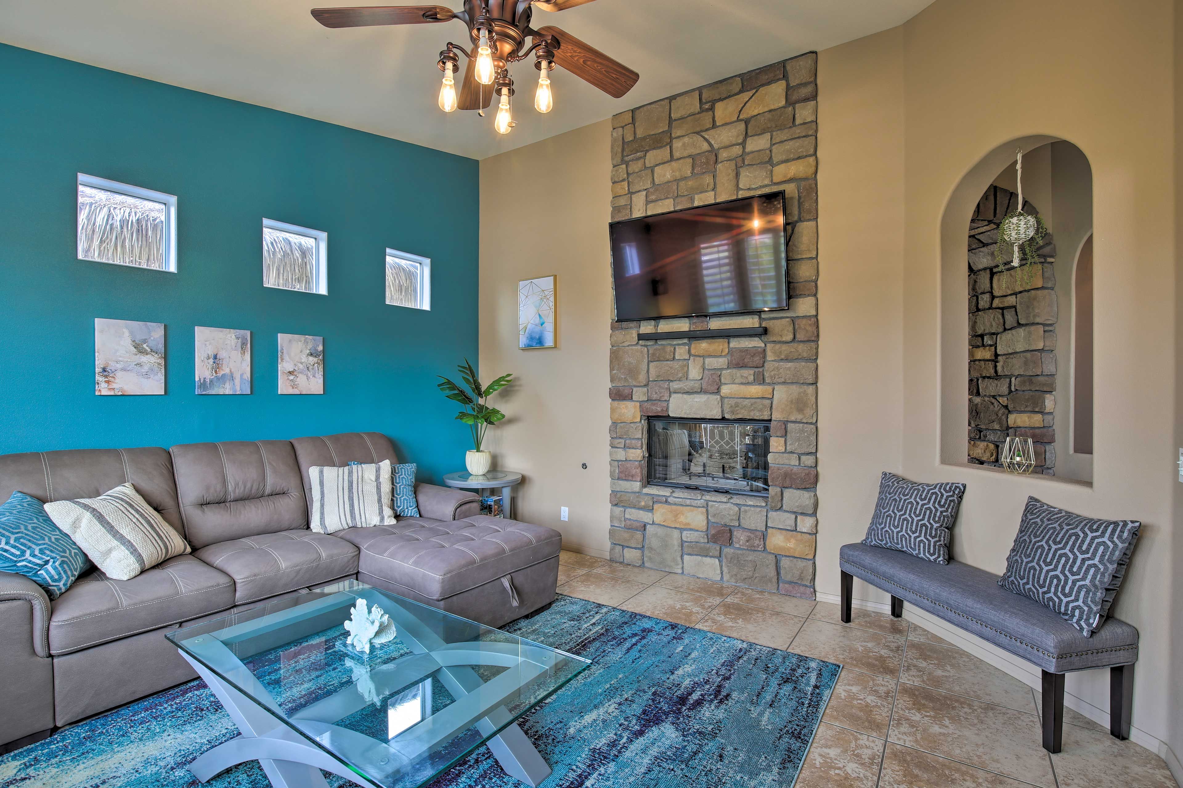 Gather around the dual-sided fireplace.