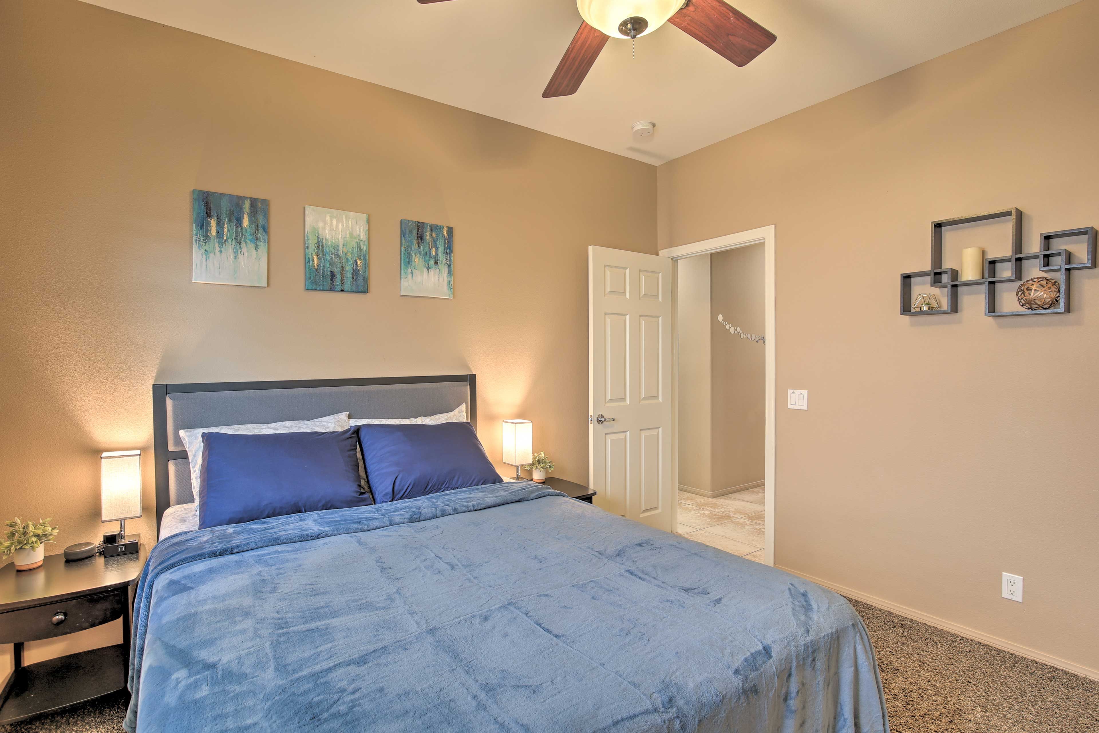 Two of the home's 3 bedrooms lead directly to the back yard.