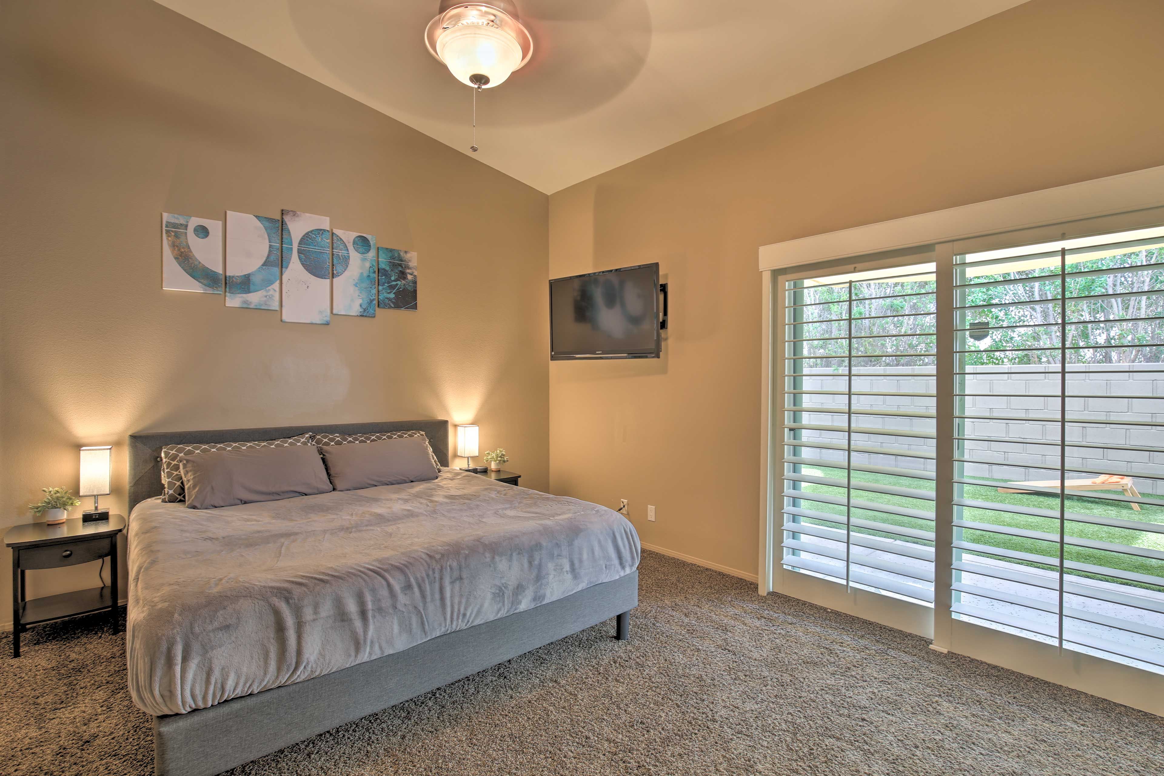 The first bedroom offers a king-sized bed & TV for 2 to enjoy.