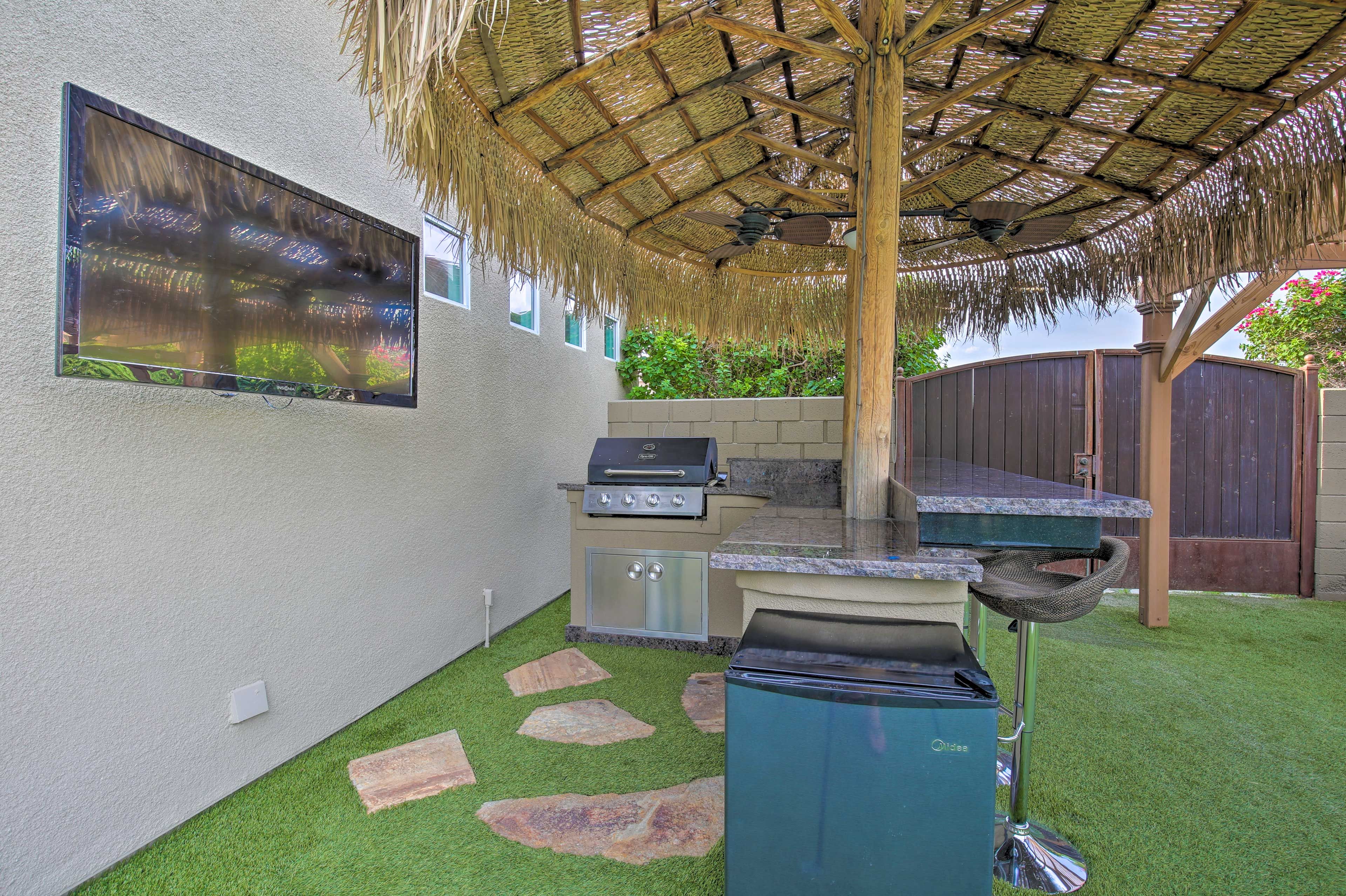 The mini-fridge, grill, & flat-screen TV truly enhance your outdoor experience.
