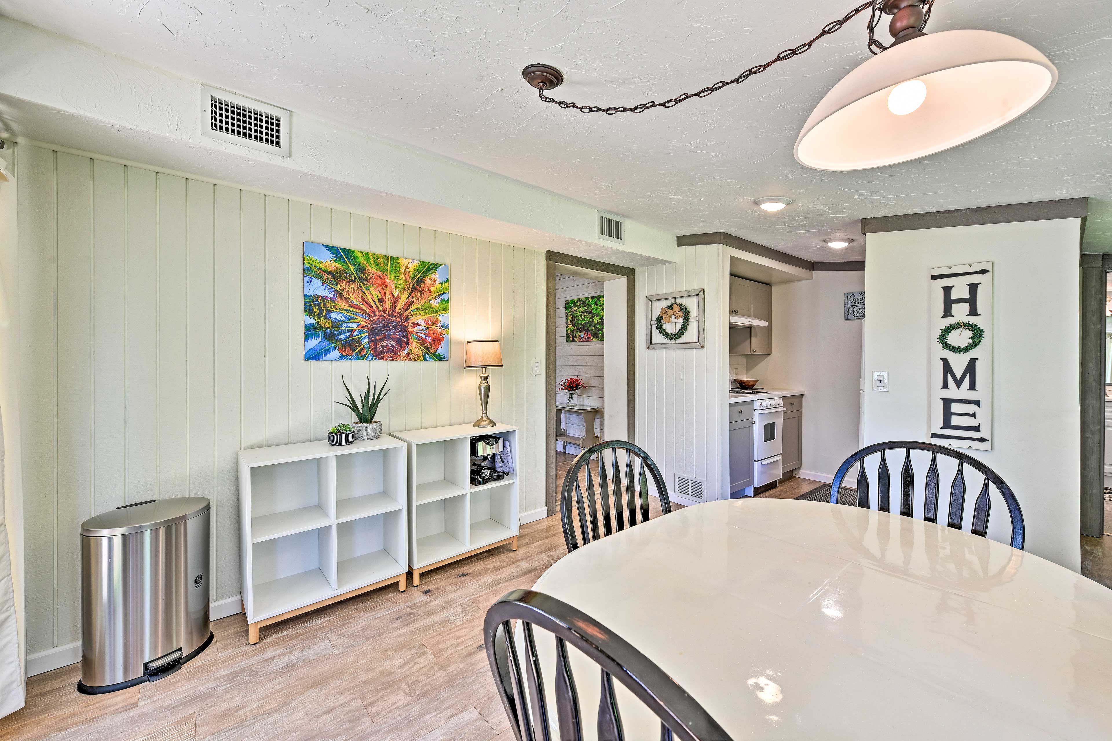 Gather at the rounded dining table to dig into home-cooked meals.