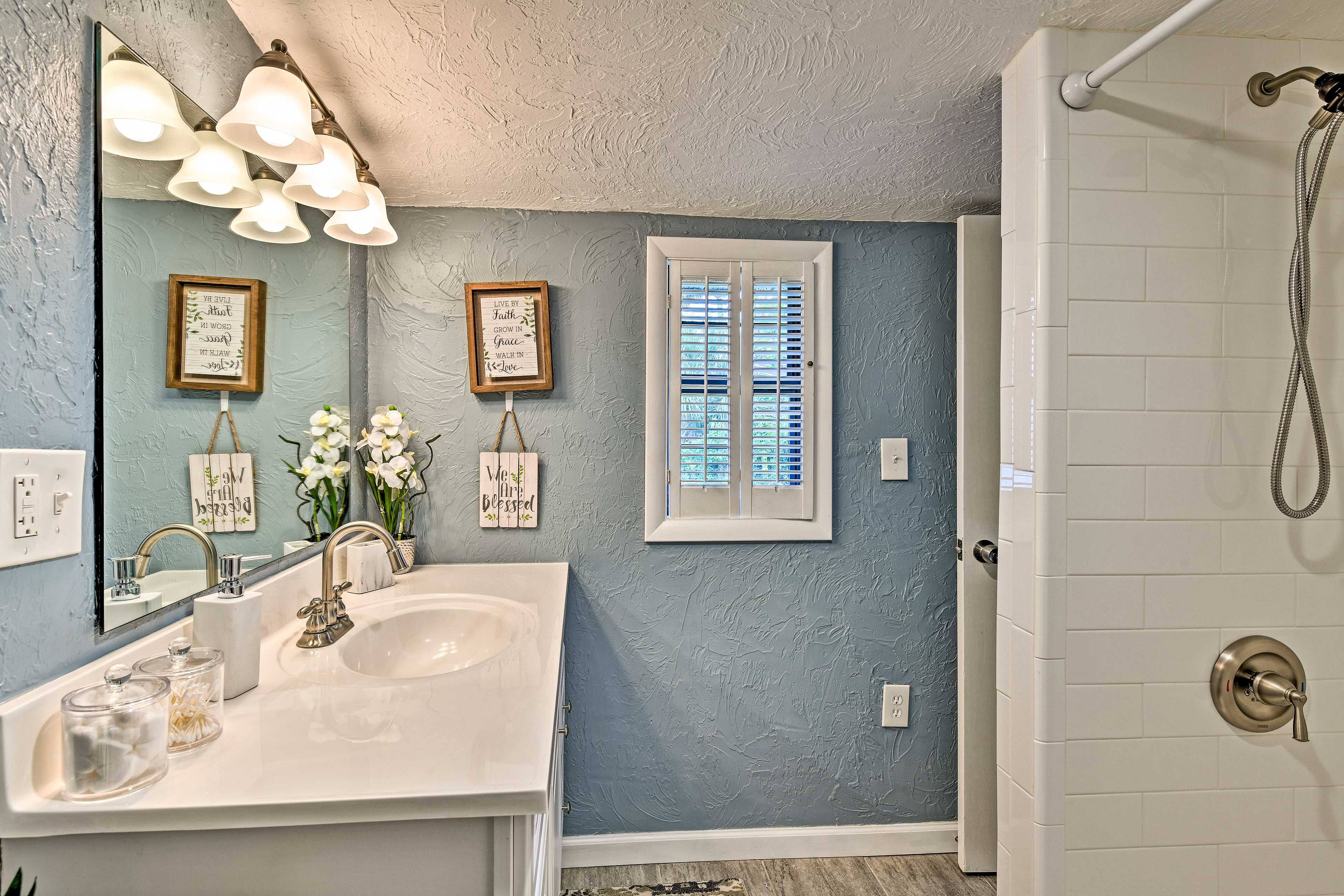 The Jack-and-Jill bathroom boasts a walk-in shower.