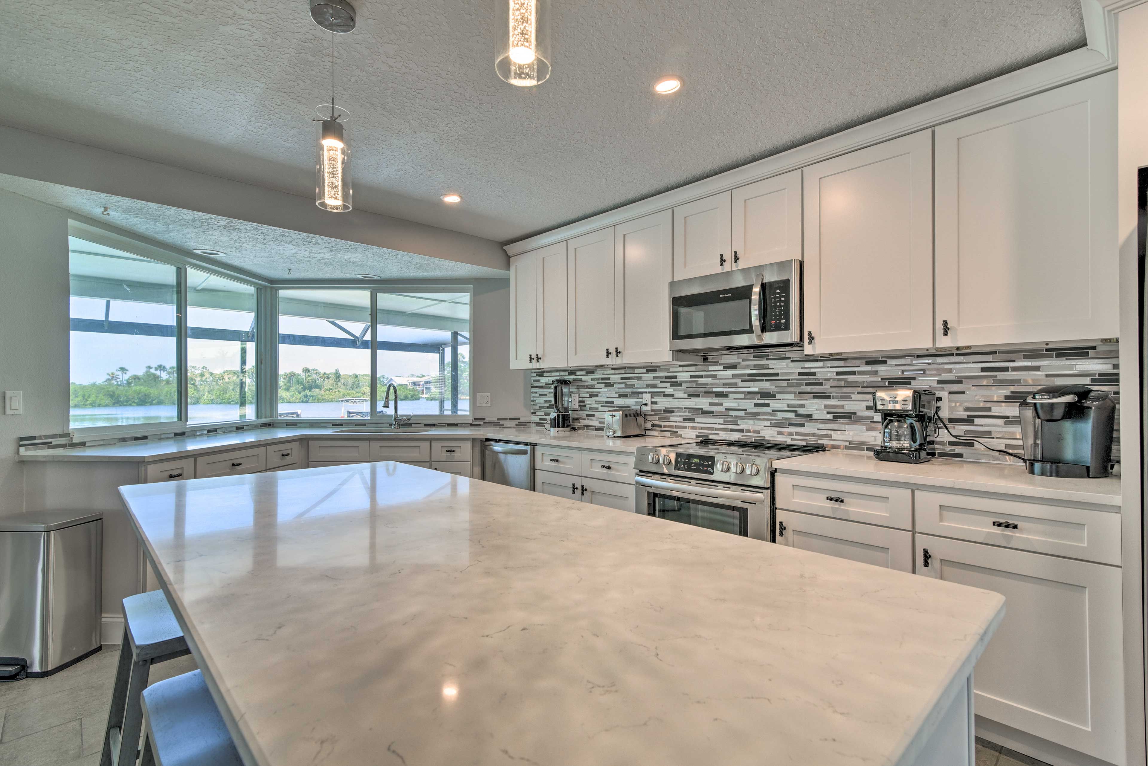 Enter the new kitchen and sit at the breakfast bar as your partner prepares food
