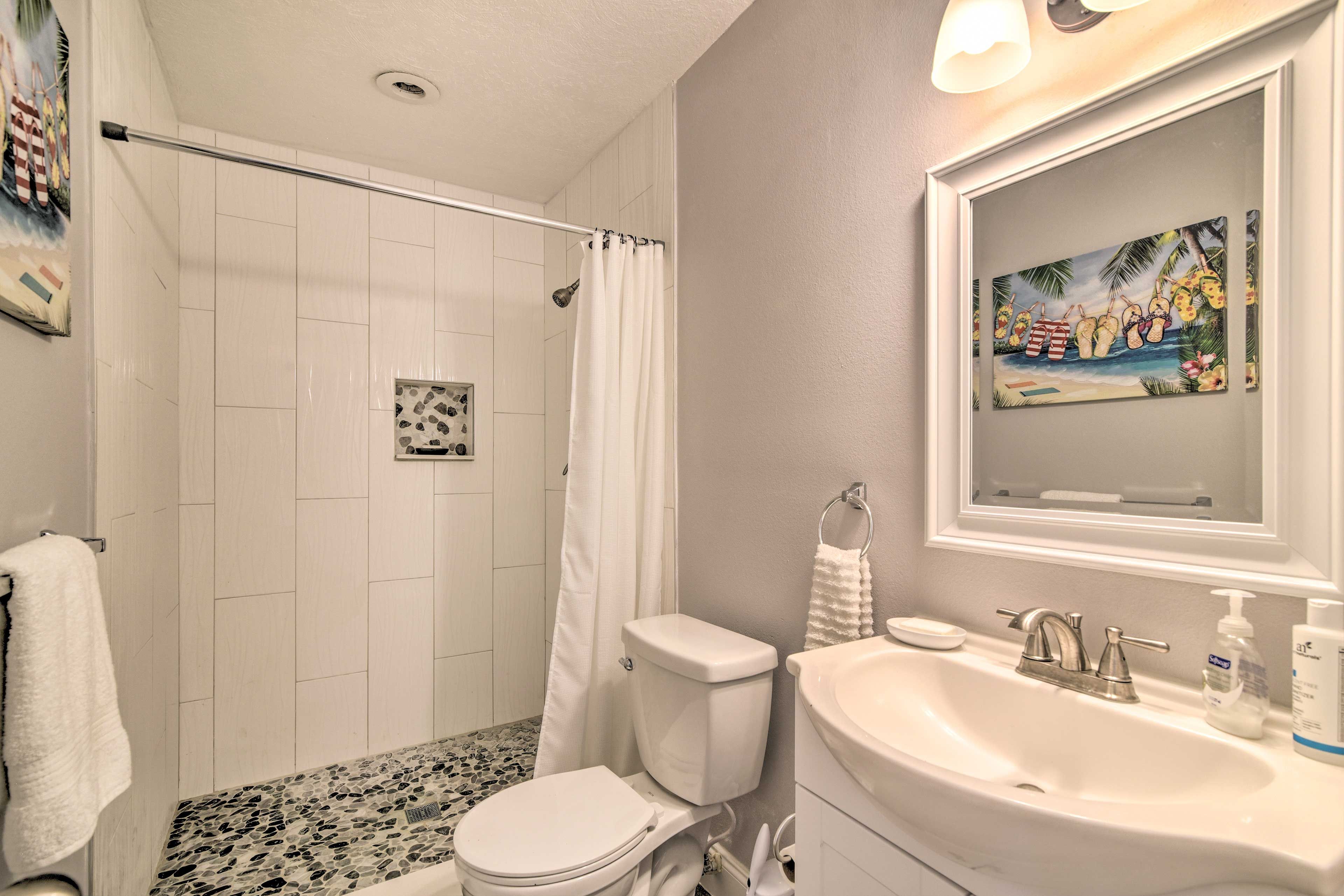 The third bathroom features a walk-in shower.