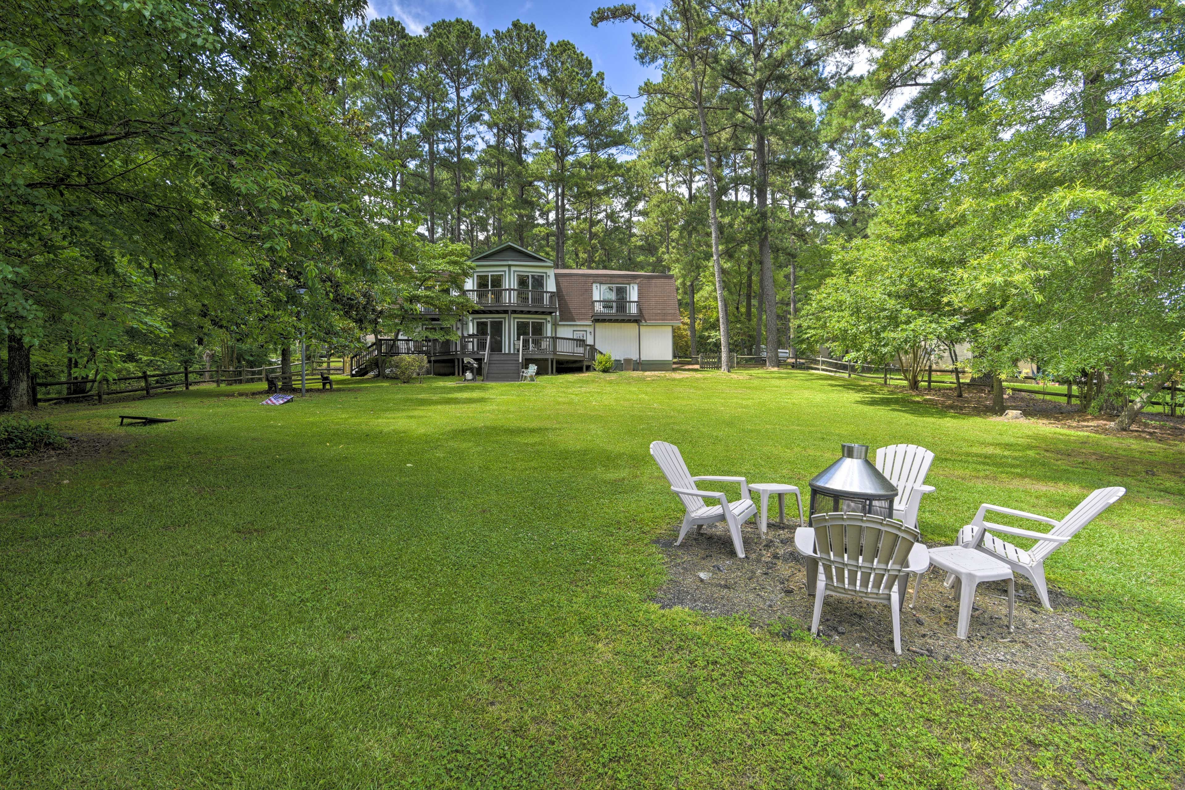 Gather round the fire pit in the spacious yard.