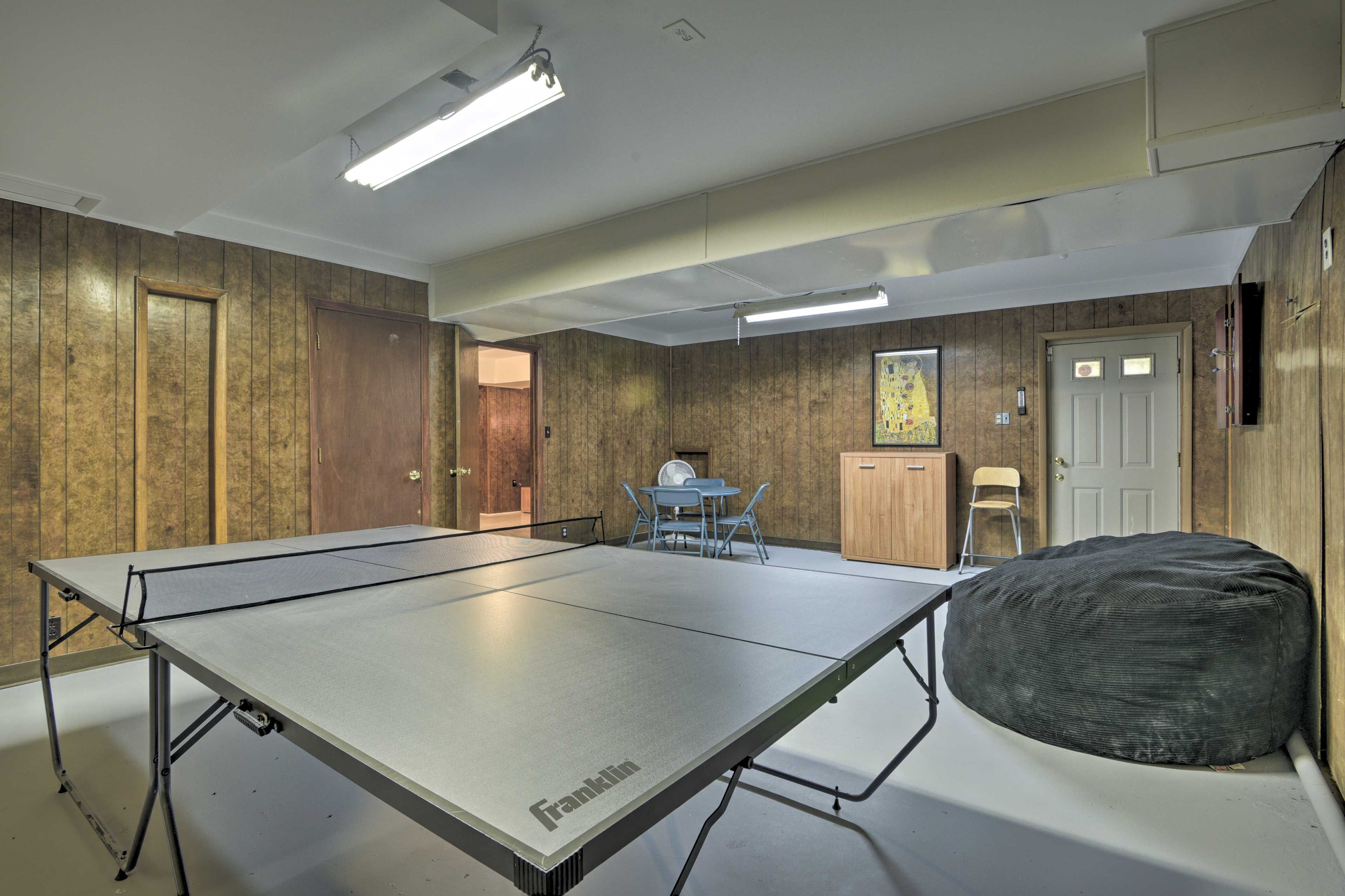 Play some ping pong on the game table.