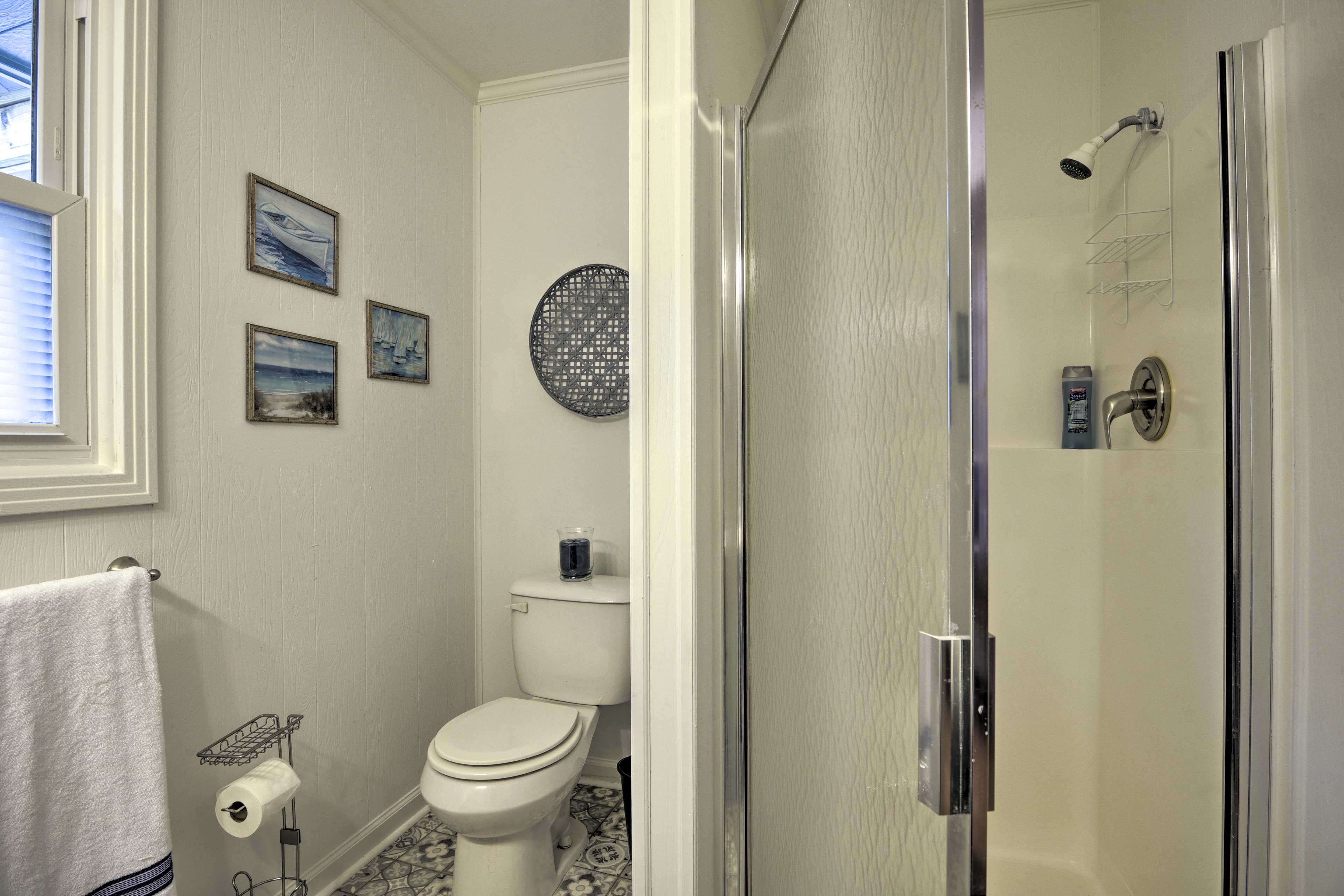 There's a shower tucked in the corner.