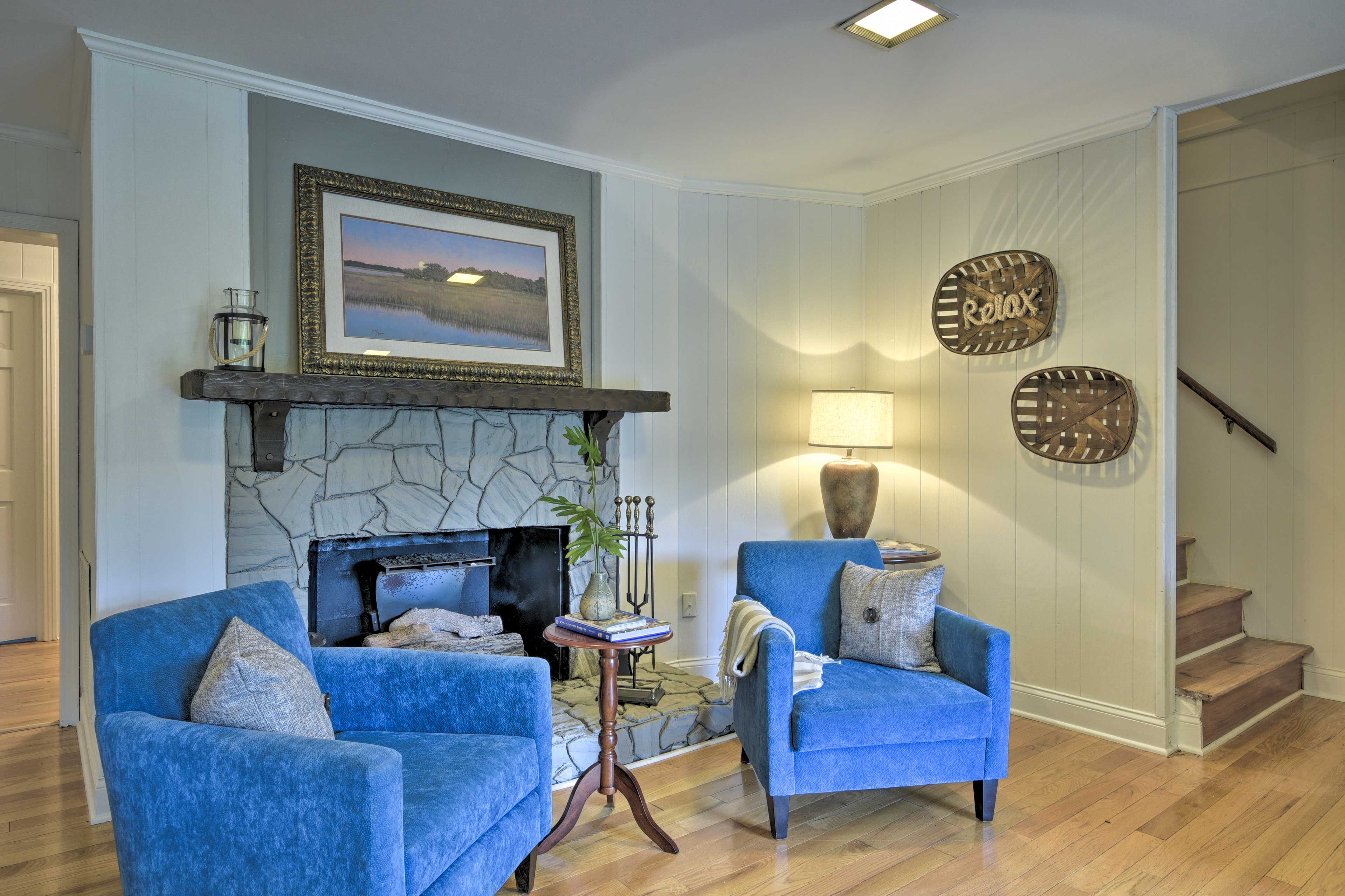 Cozy up in one of the armchairs.