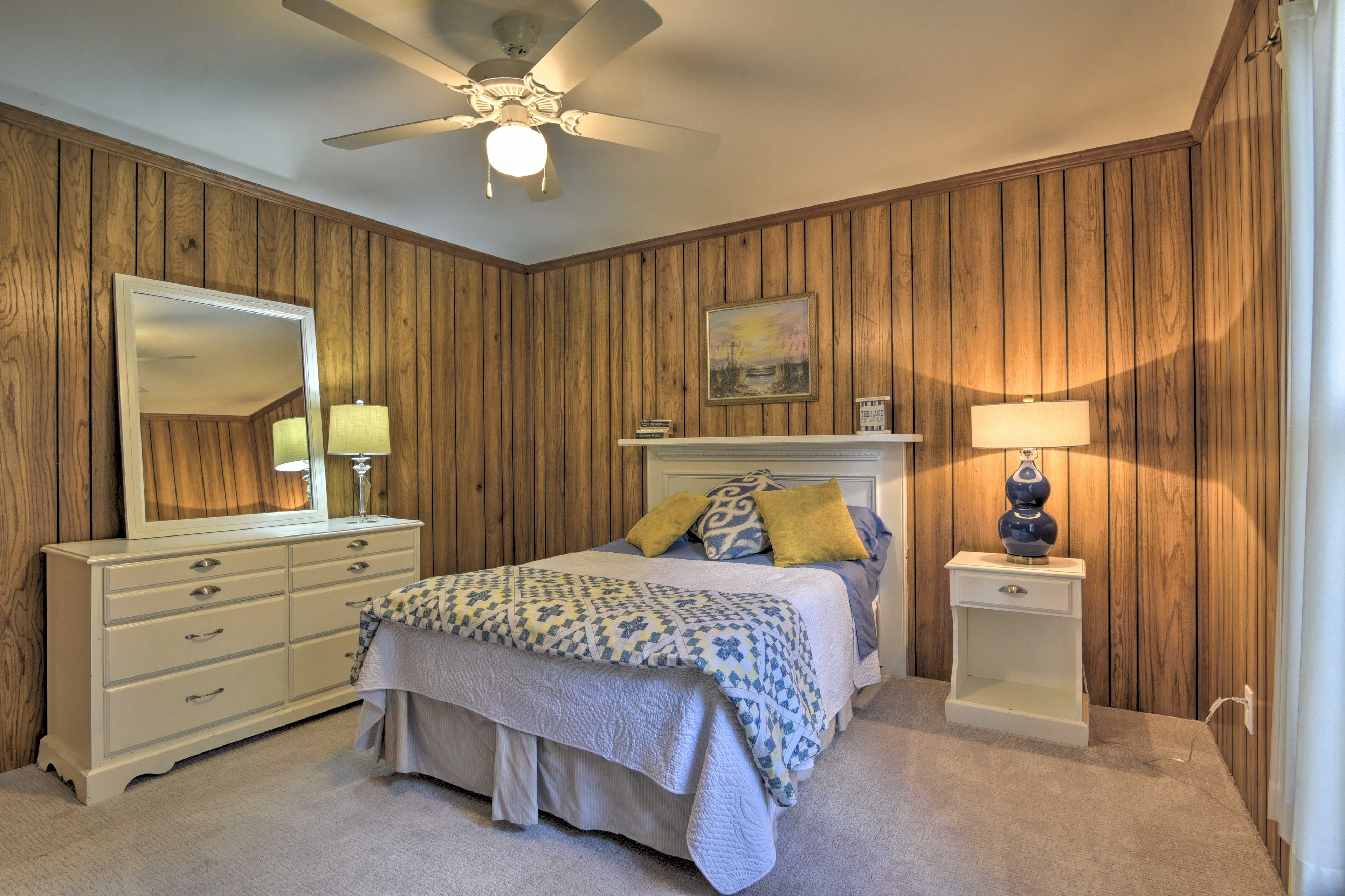 Unpack and unwind in this bedroom hosting a full bed.