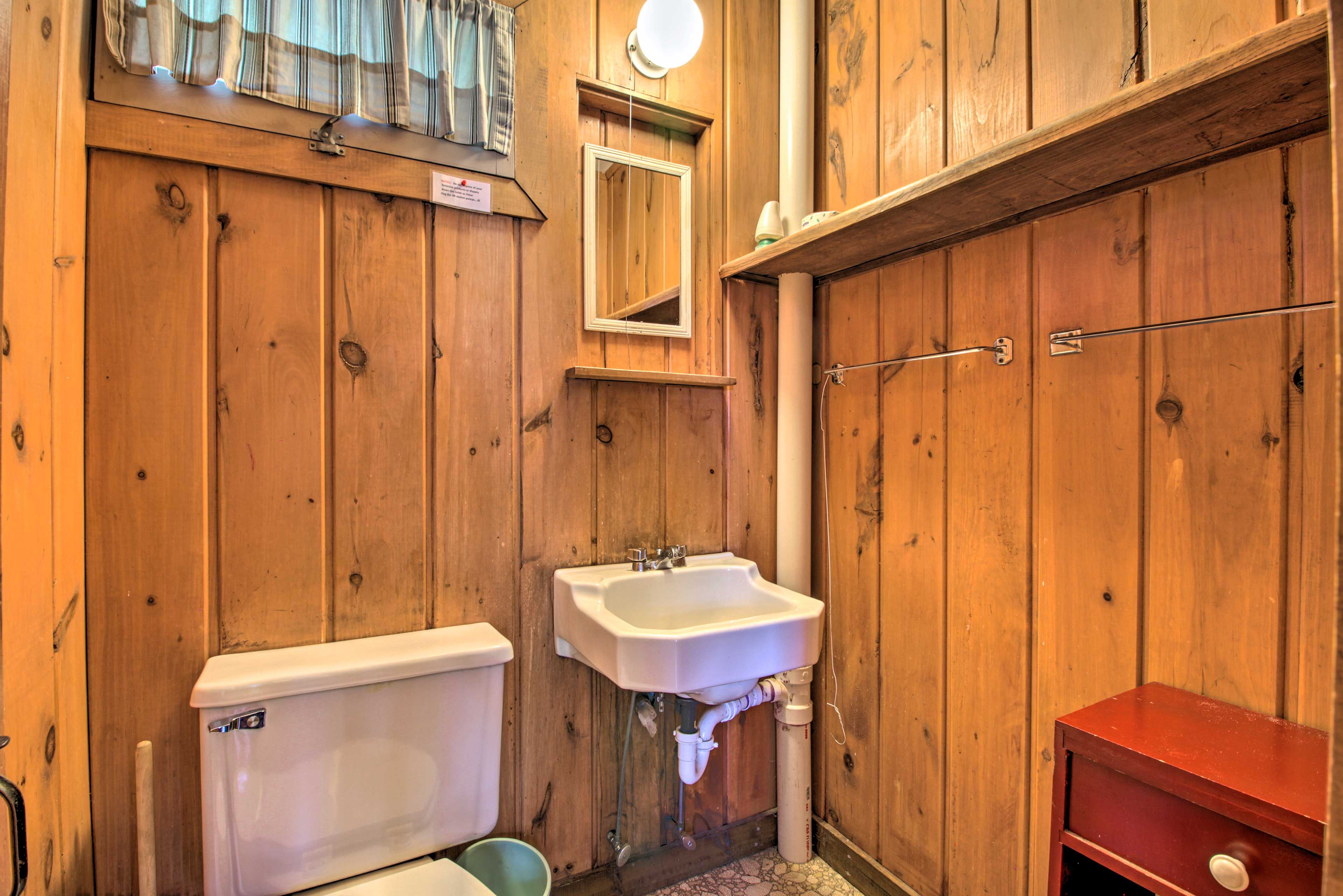 Wash up in this half bath.