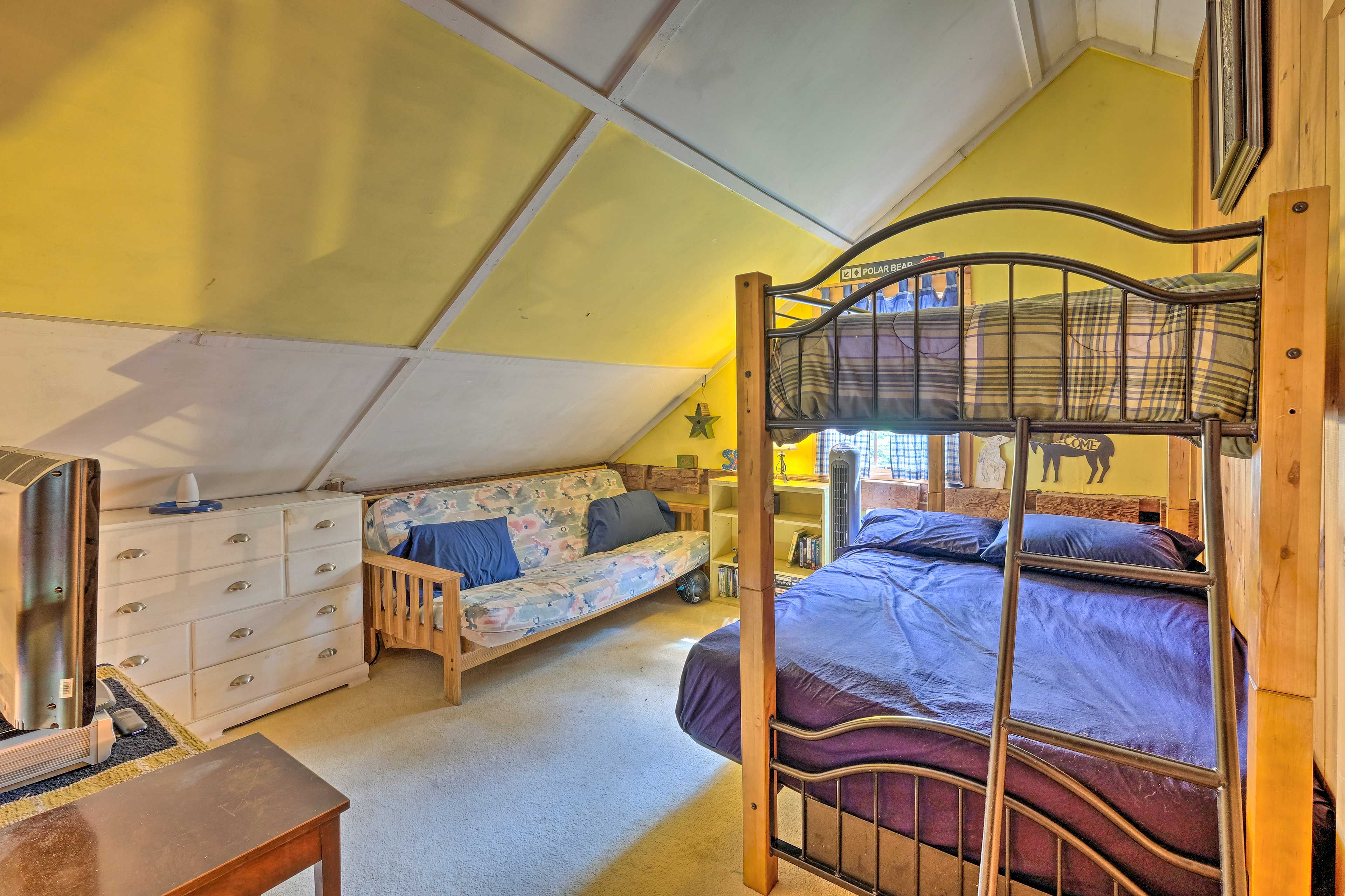 A second bedroom has a twin/full bunk bed and a sleeper sofa.