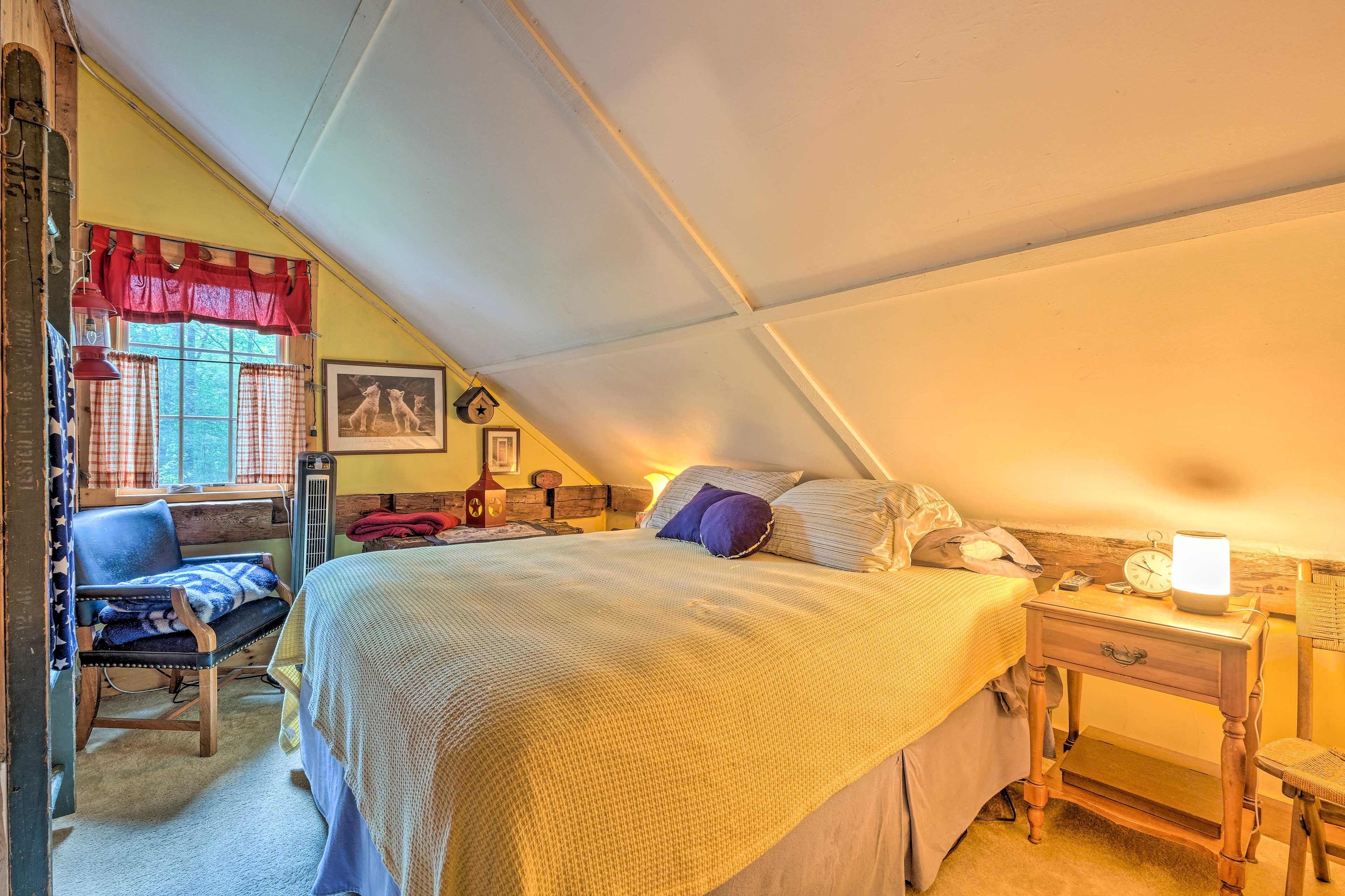 There is a queen bed in the master upstairs.