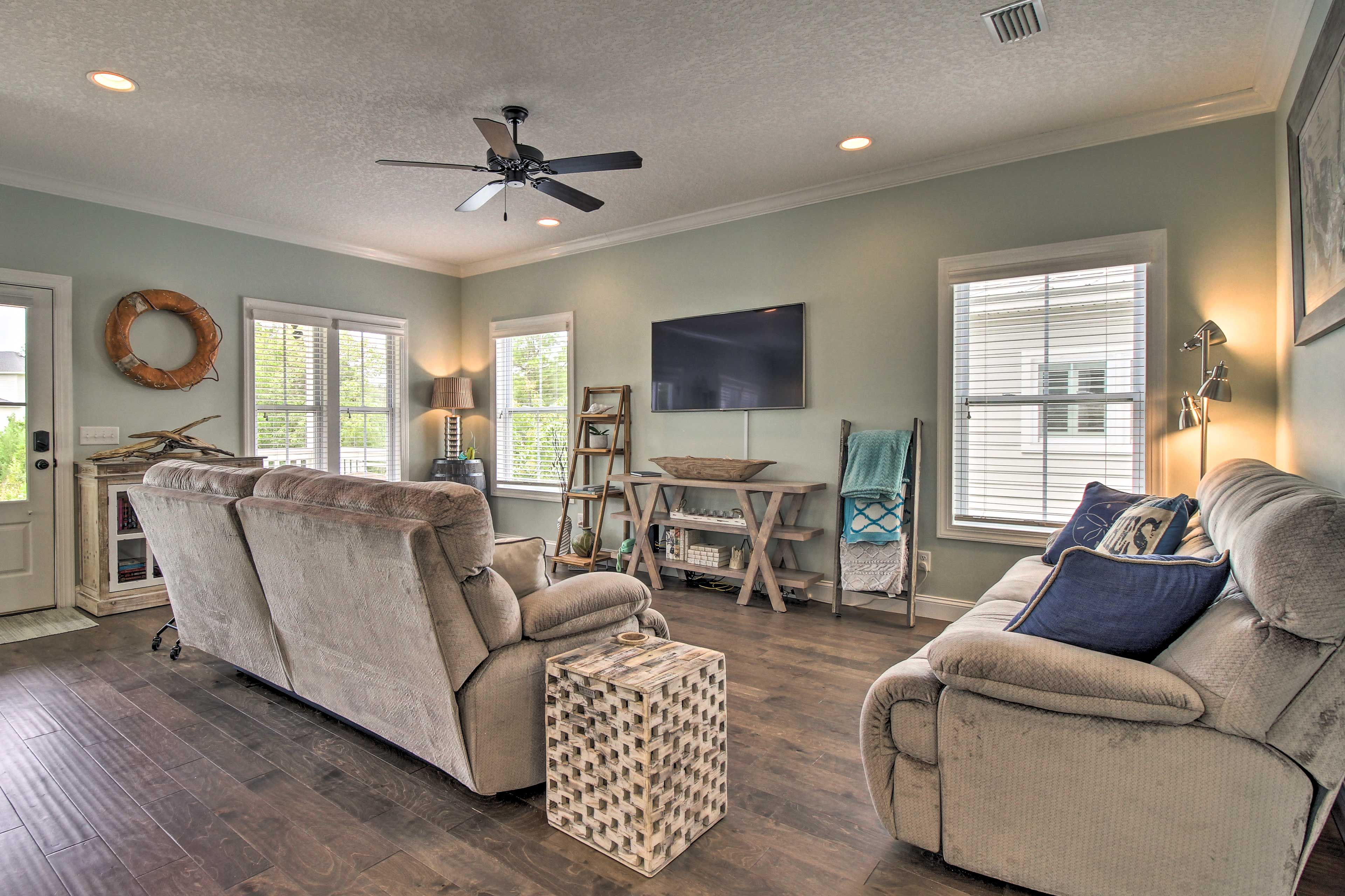 Enjoy a movie on the flat-screen TV while cozying up on the couch.