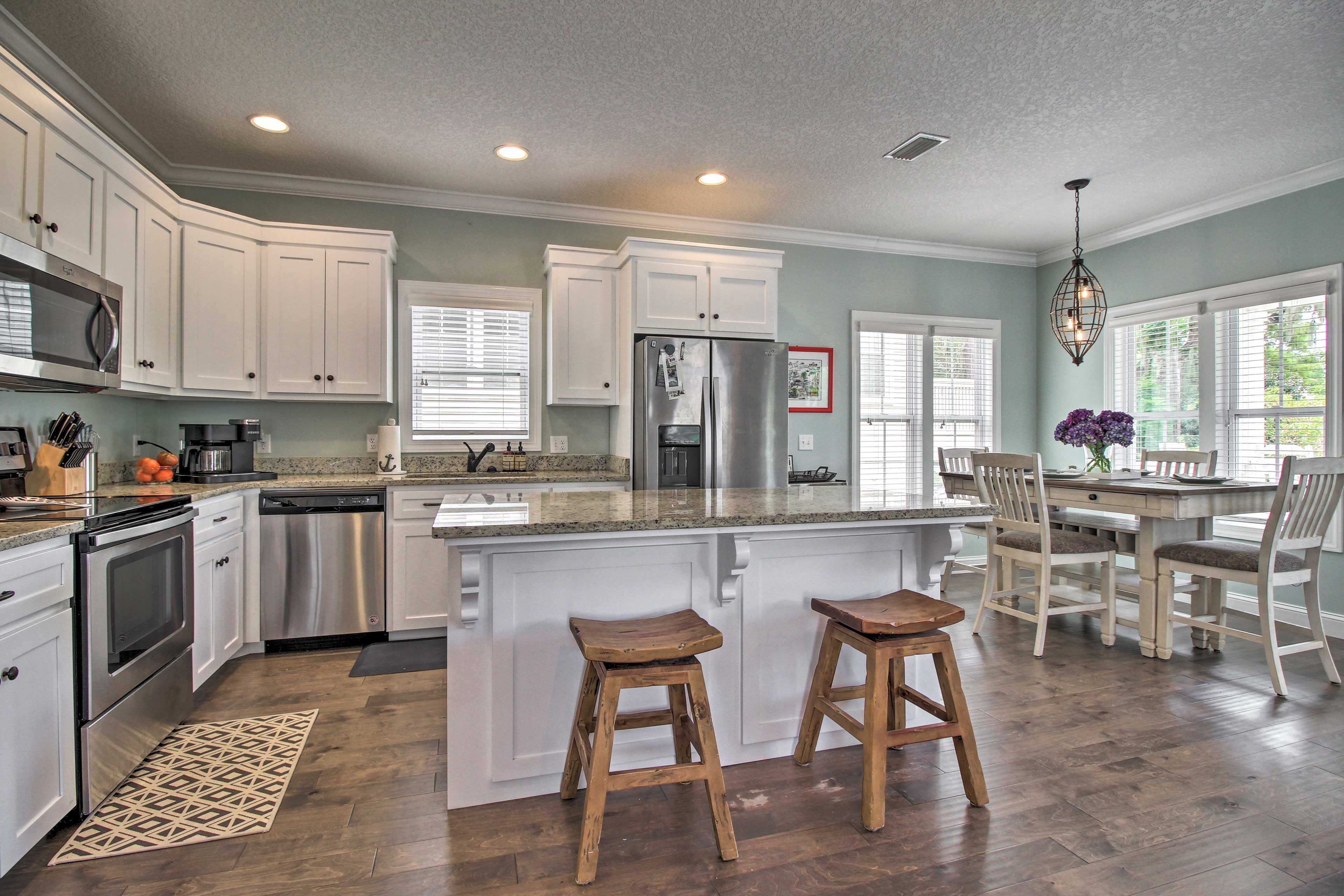 Stainless steel appliances complete this spacious kitchen.