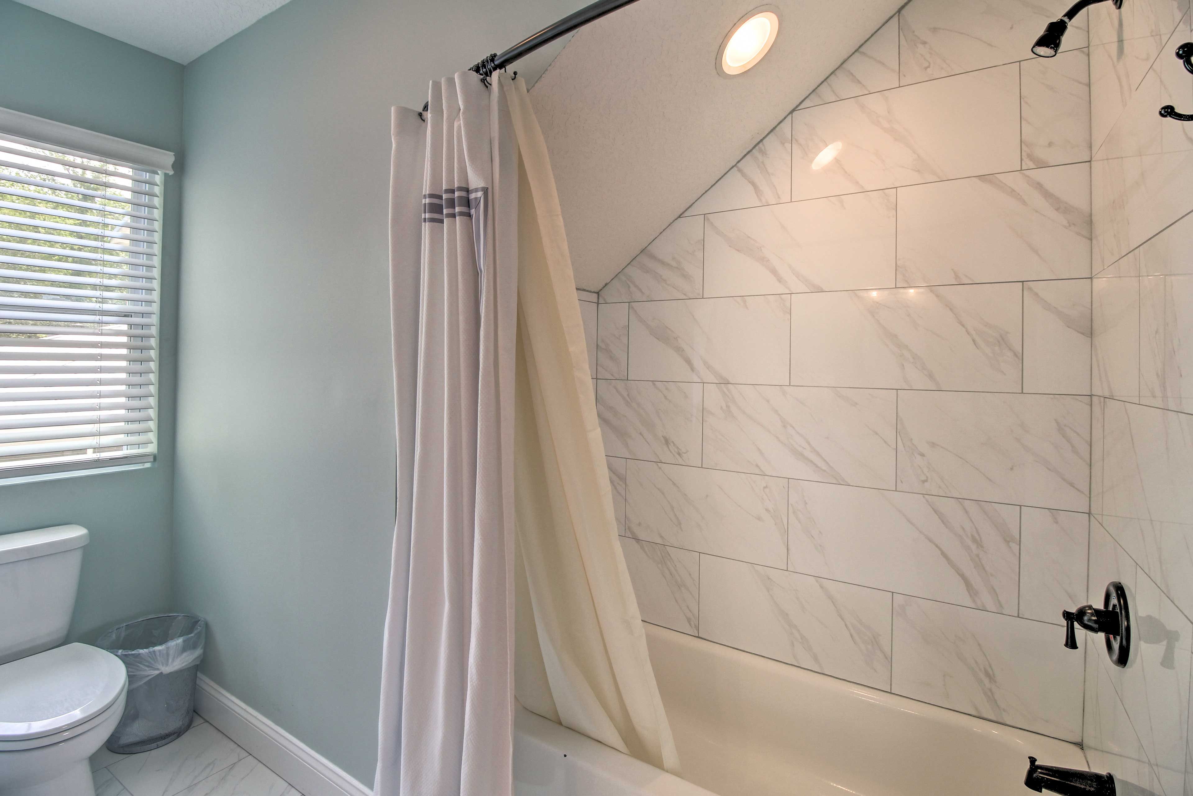 Rinse off your sandy toes in this guest bathroom.