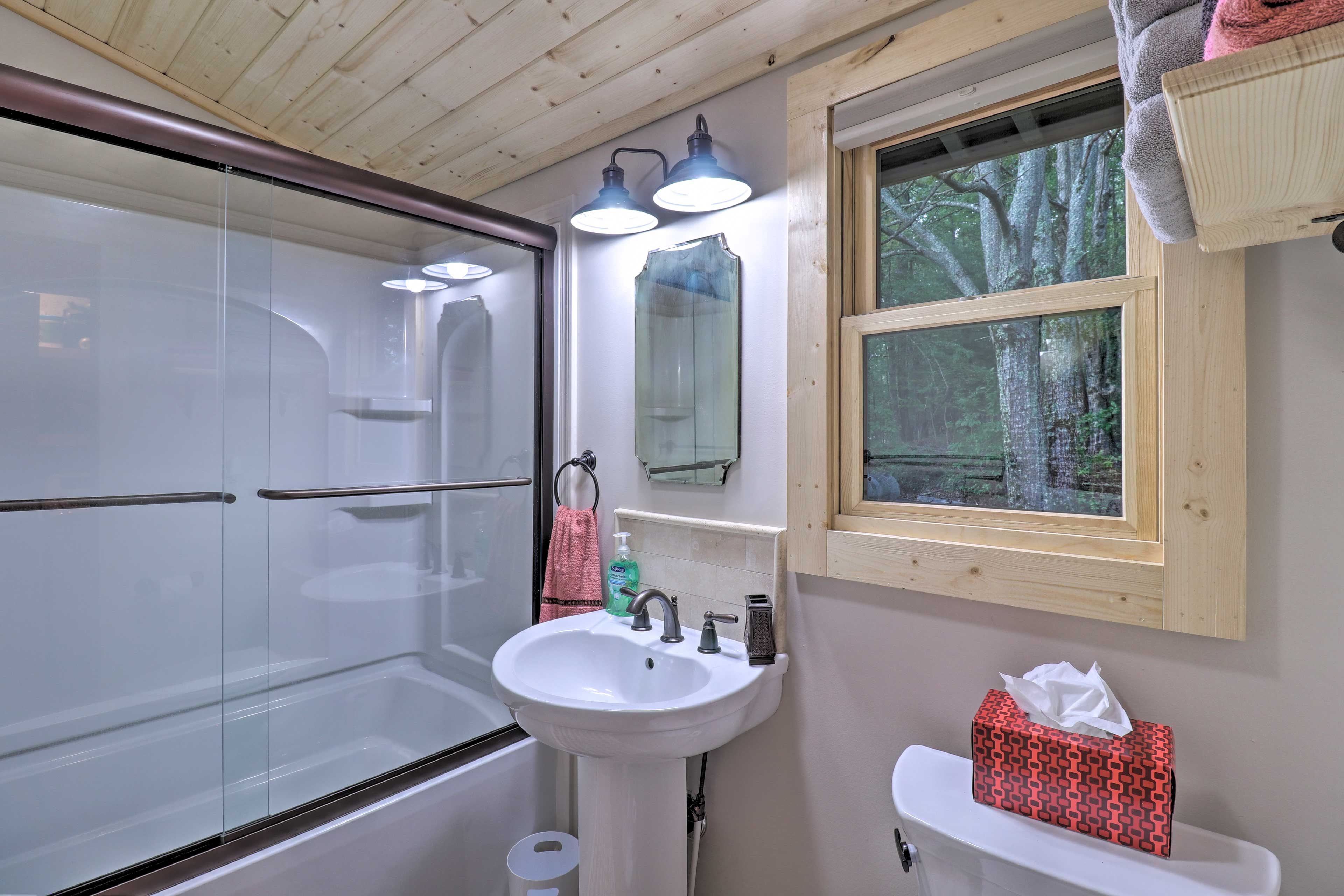 The first full bath is equipped with a shower/tub combo.